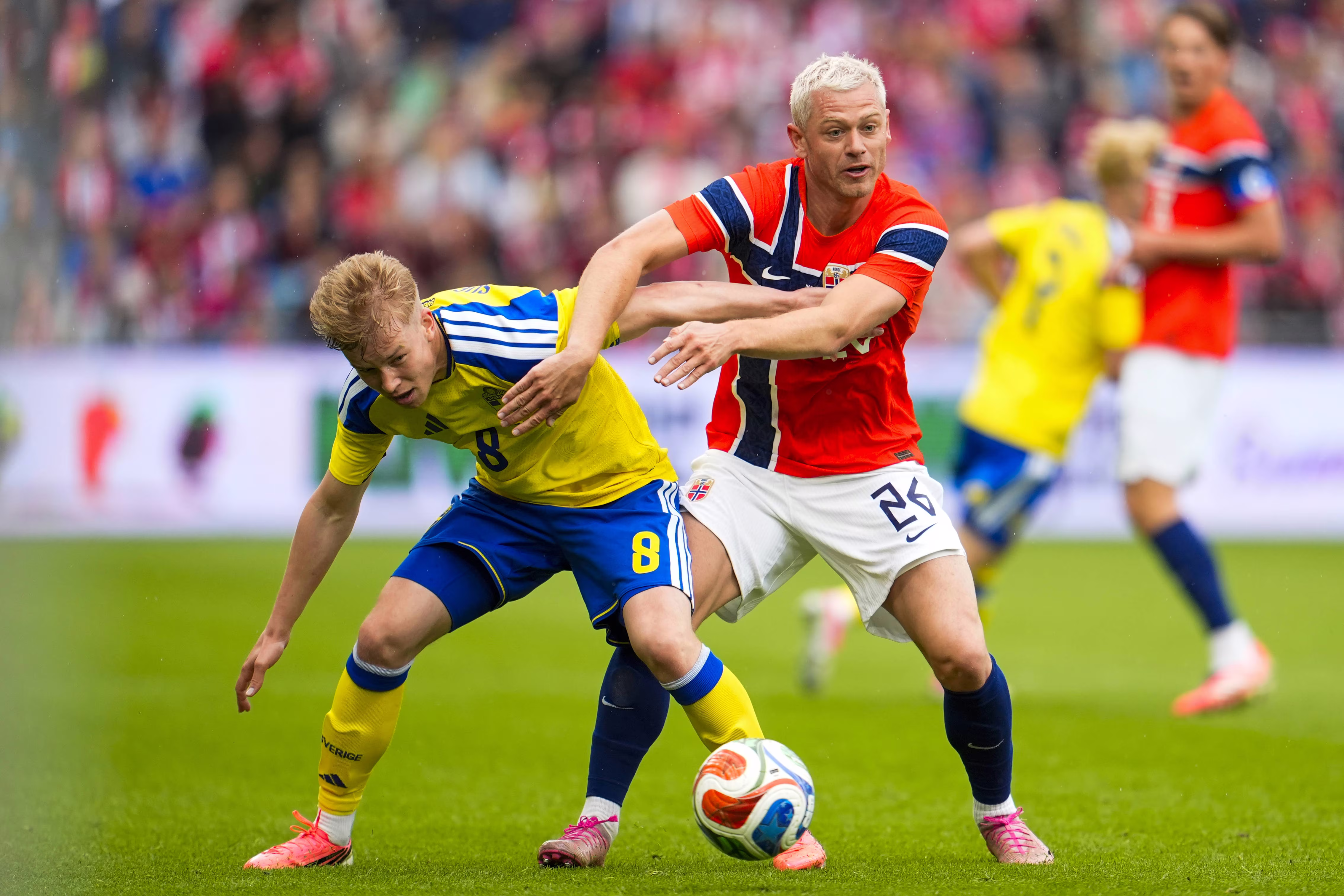 Julian Ryerson tackles Daniel Svensson
