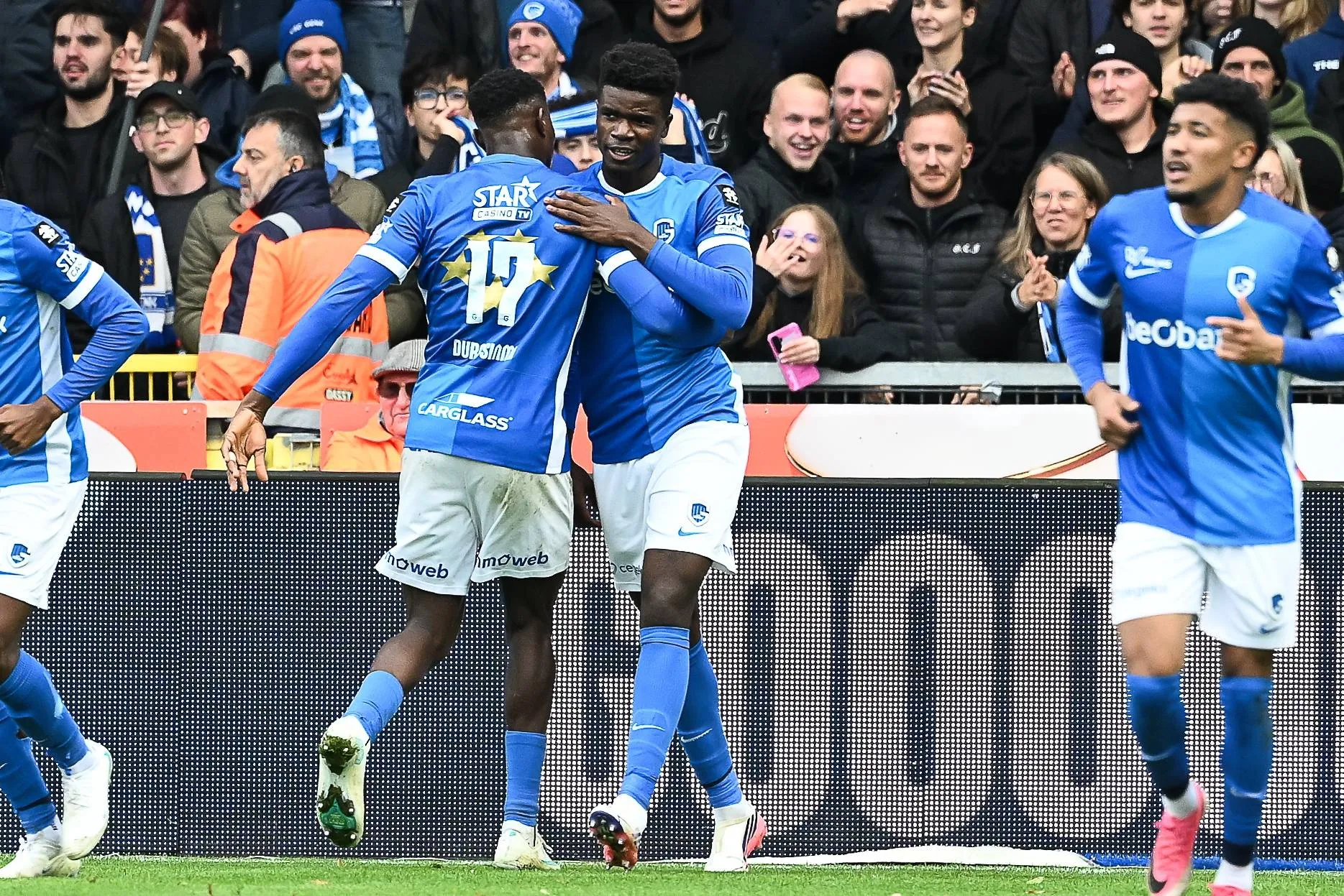 Genk's Aaron Bibout Banind celebrates with Rafiu Durosinmi