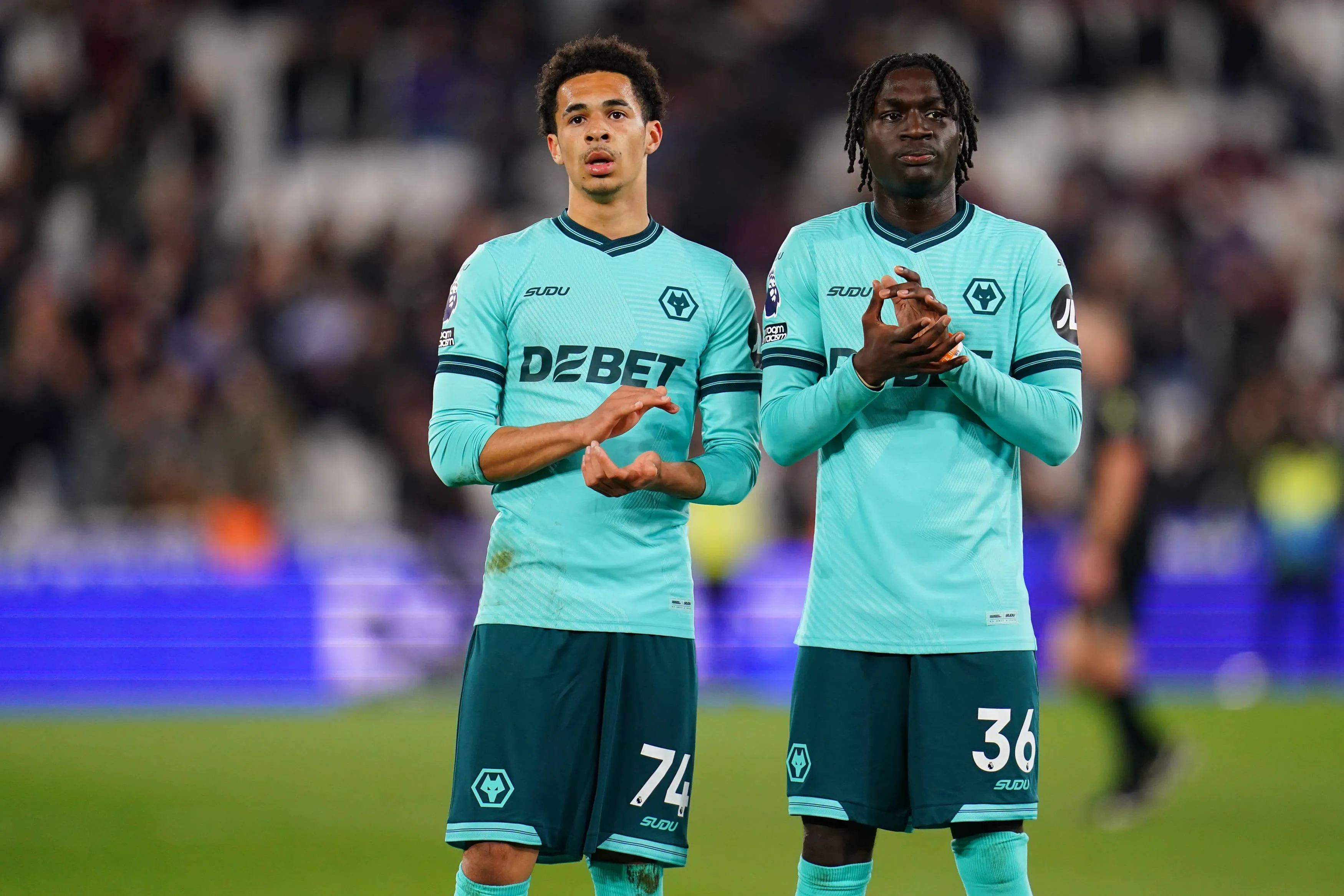 Tom Edozie and Mateus Mane of Wolverhampton Wanderers