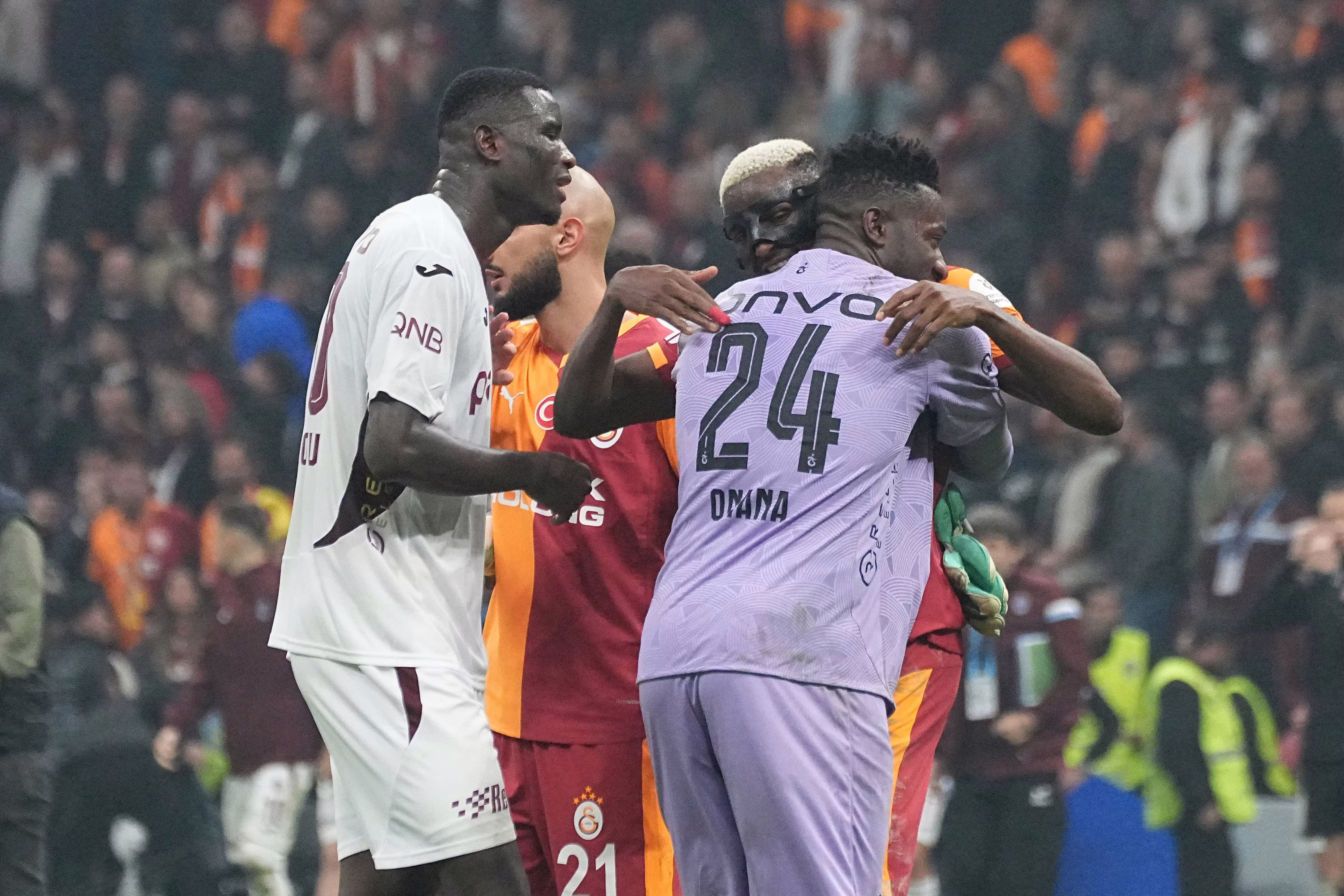 Victor Osimhen R of Galatasaray and Paul Onuachu and Goalkeeper Andre Onana of Trabzonspor