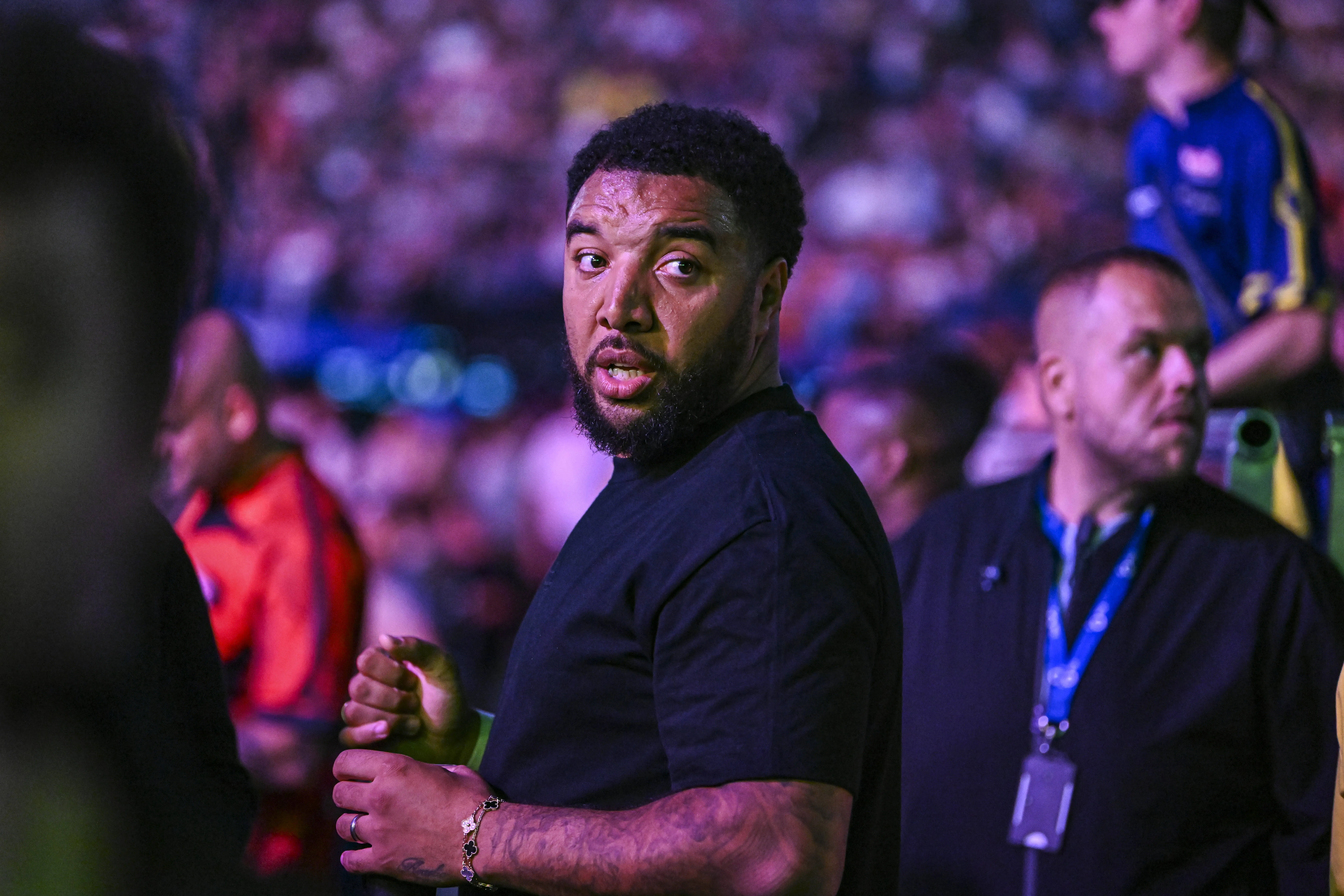 Former footballer Troy Deeney enjoys the darts