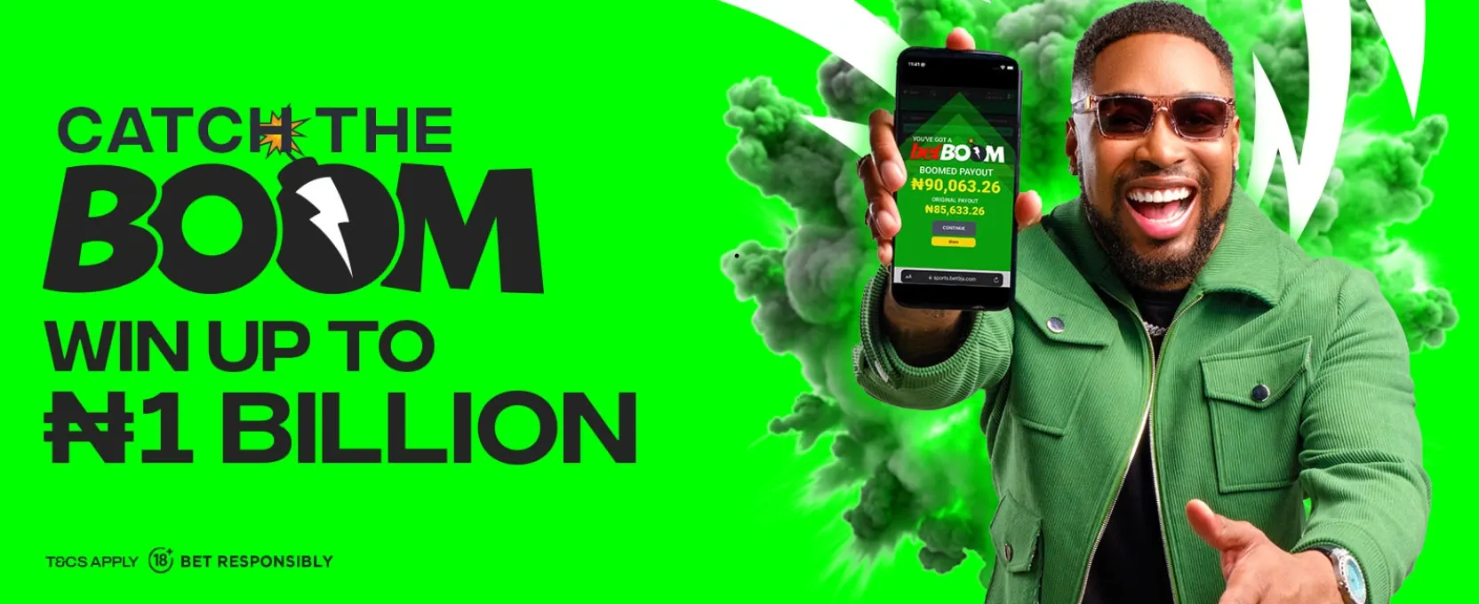 Bet9ja betBOOM promotion banner showing a smiling customer holding a mobile phone displaying a BOOMED sports bet payout.