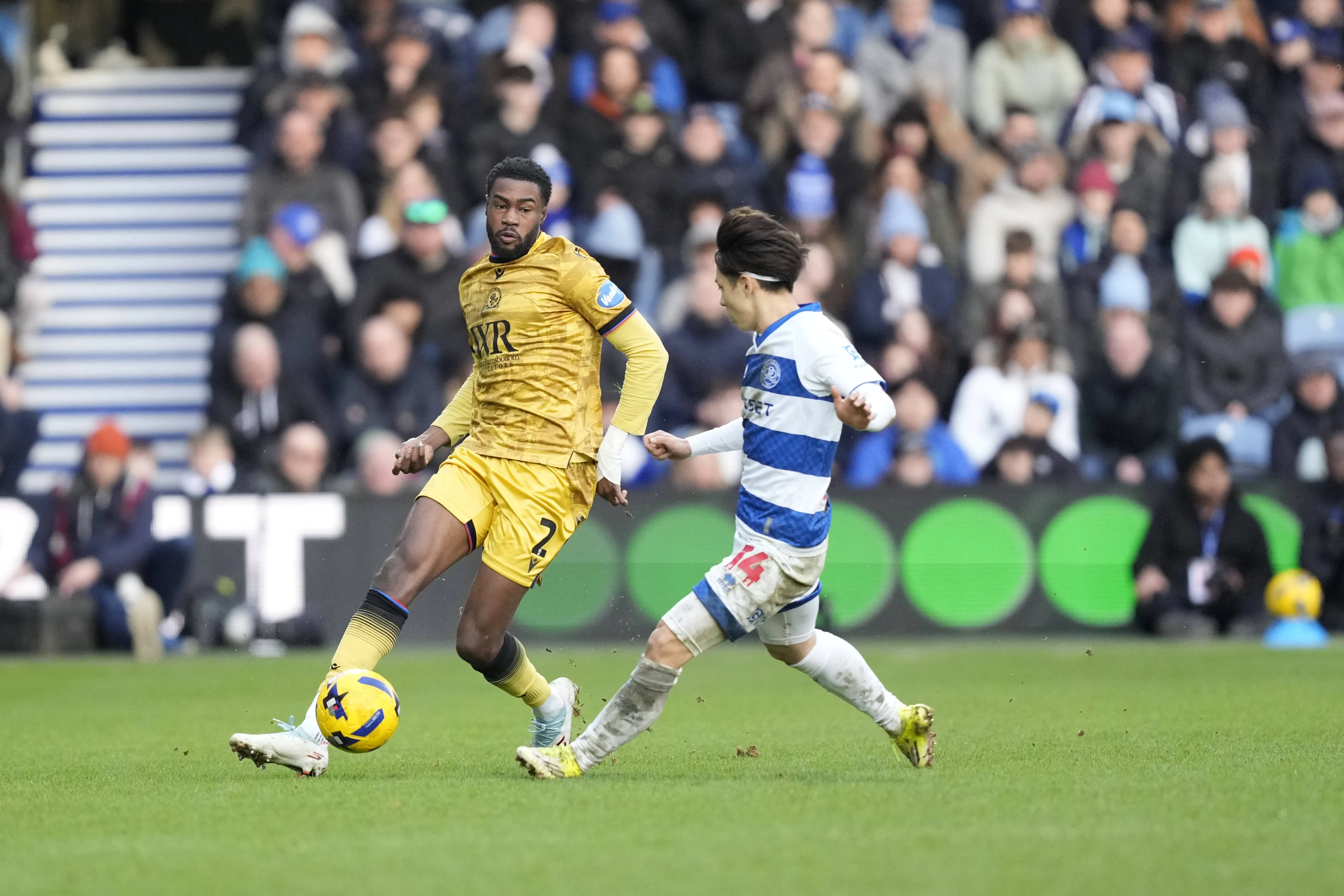 Ryan Alebiosu passes the ball during the EFL Sky Bet Championship match between Queens Park Rangers and Blackburn Rovers