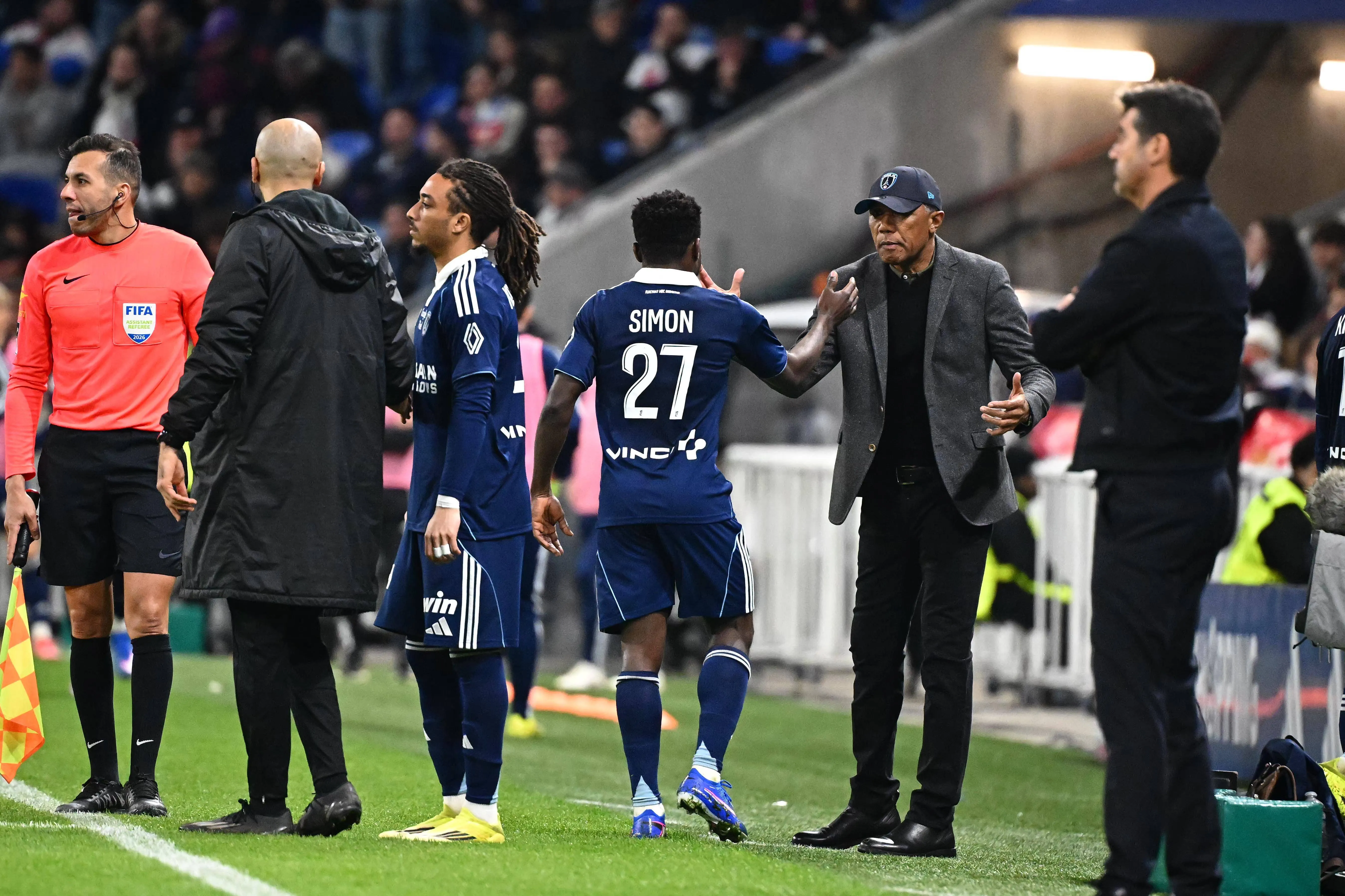 Paris FC winger Moses Simon and manager Antoine Kombouar&eacute;