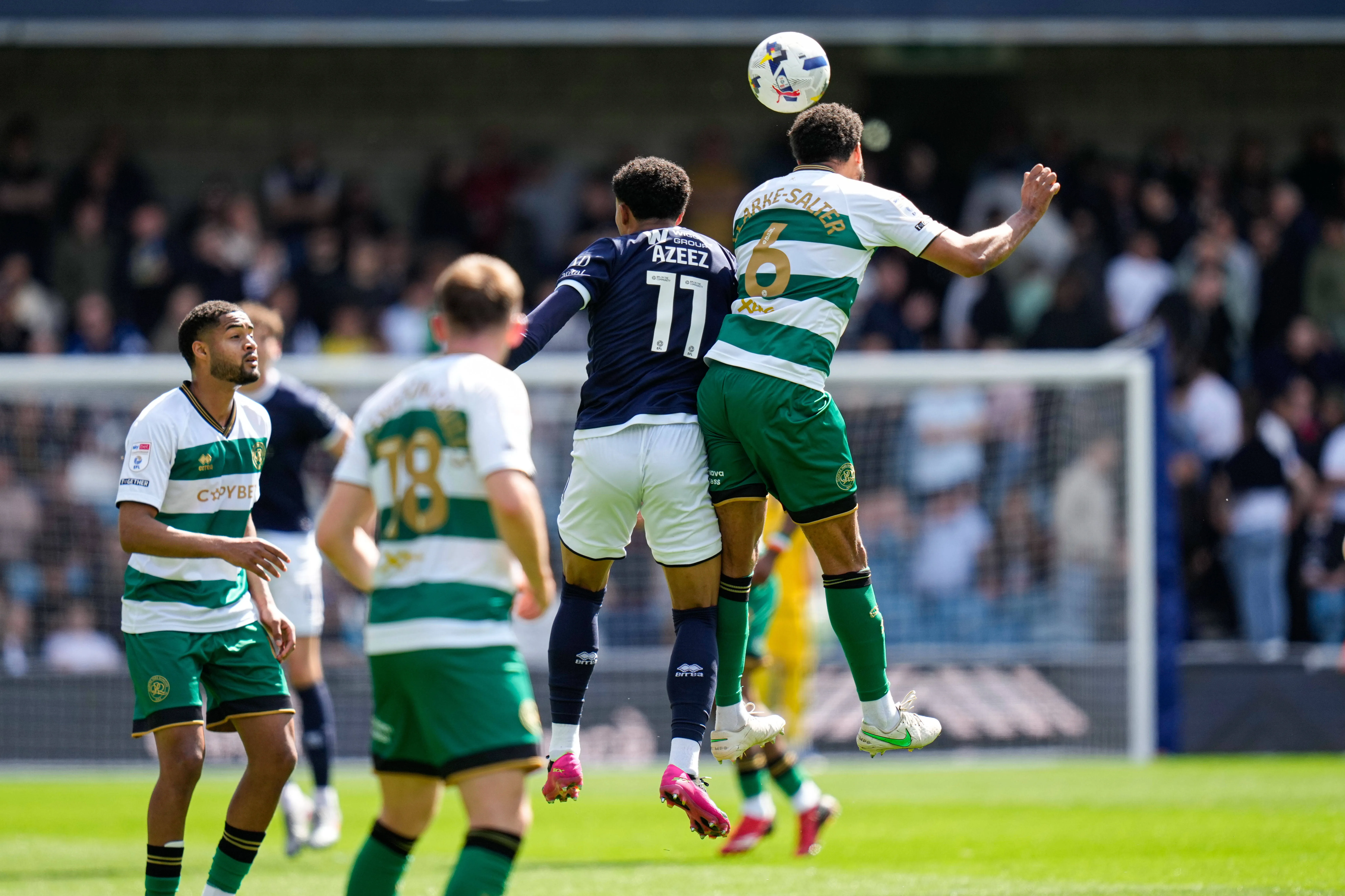  England EFL Championship Football, Millwall versus Queens park Rangers Jake Clarke-Salter of Queens Park Rangers wins a clearing header against Femi Azeez of Millwall