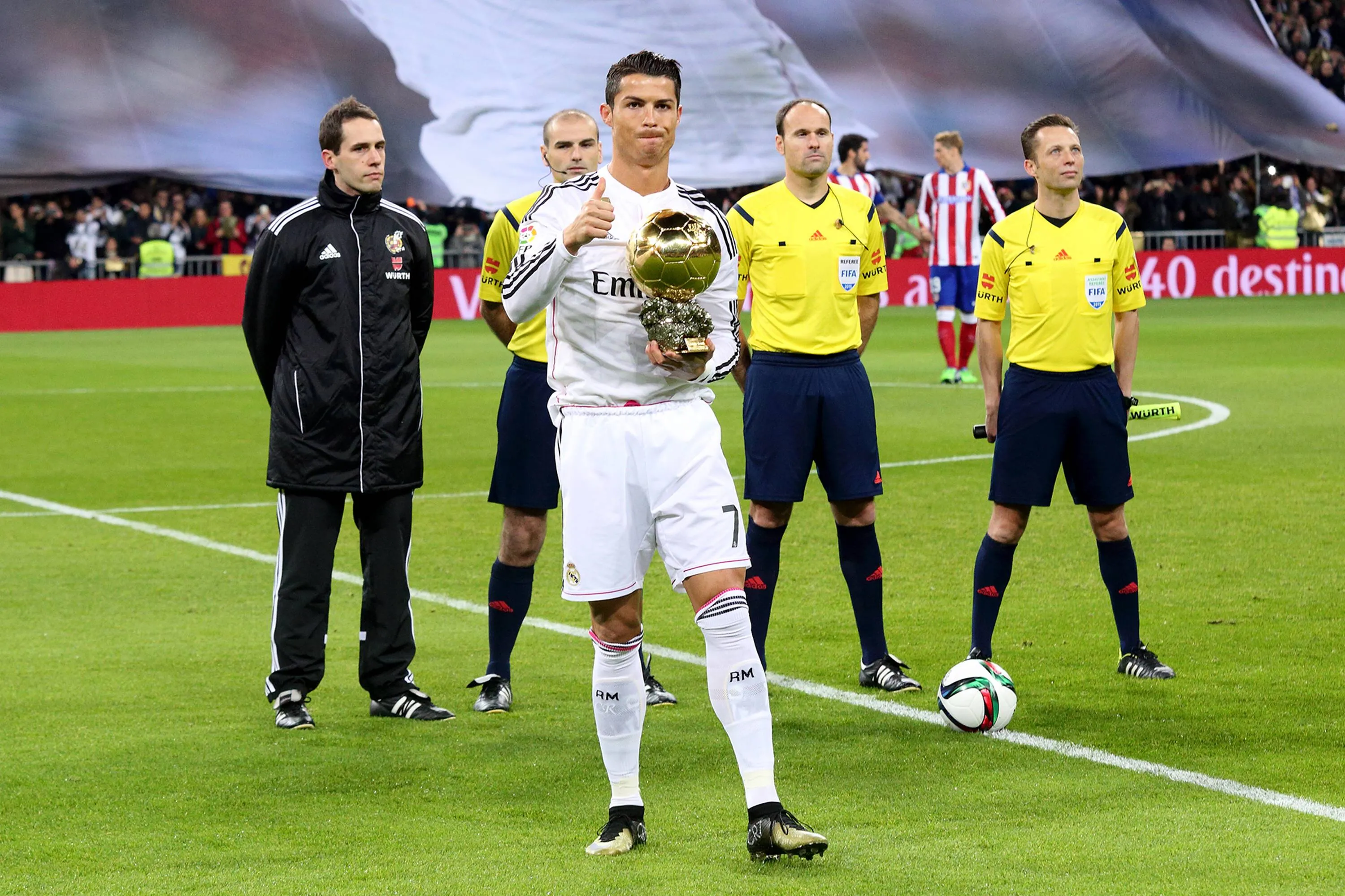 Cristiano Ronaldo forward from Real Madrid CF, holds the FIFA Ballon d’Or 2014 award