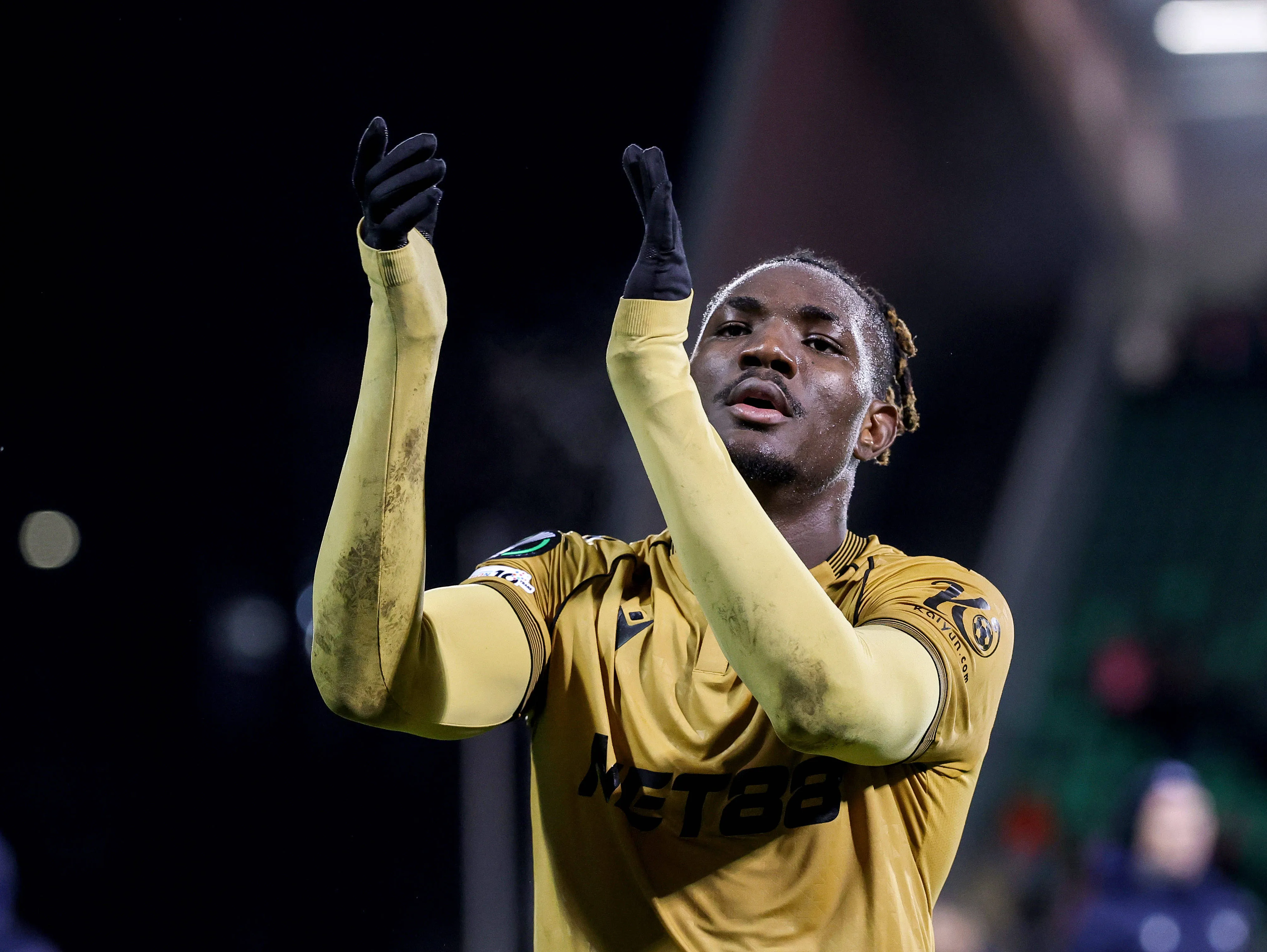 Christantus Uche celebrates winning the match