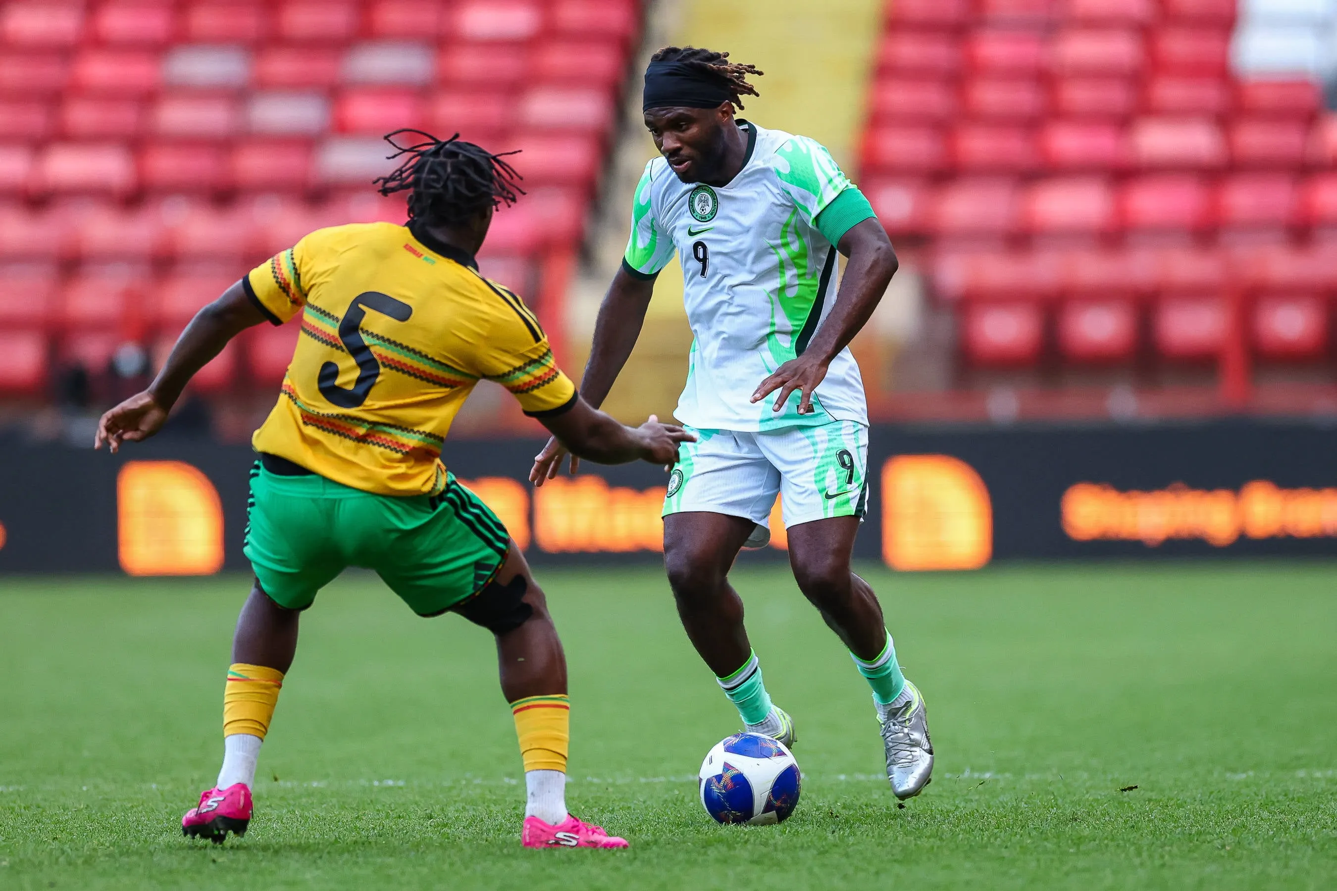 Jamaica midfielder Courtney Clarke and Nigeria forward Terem Moffi