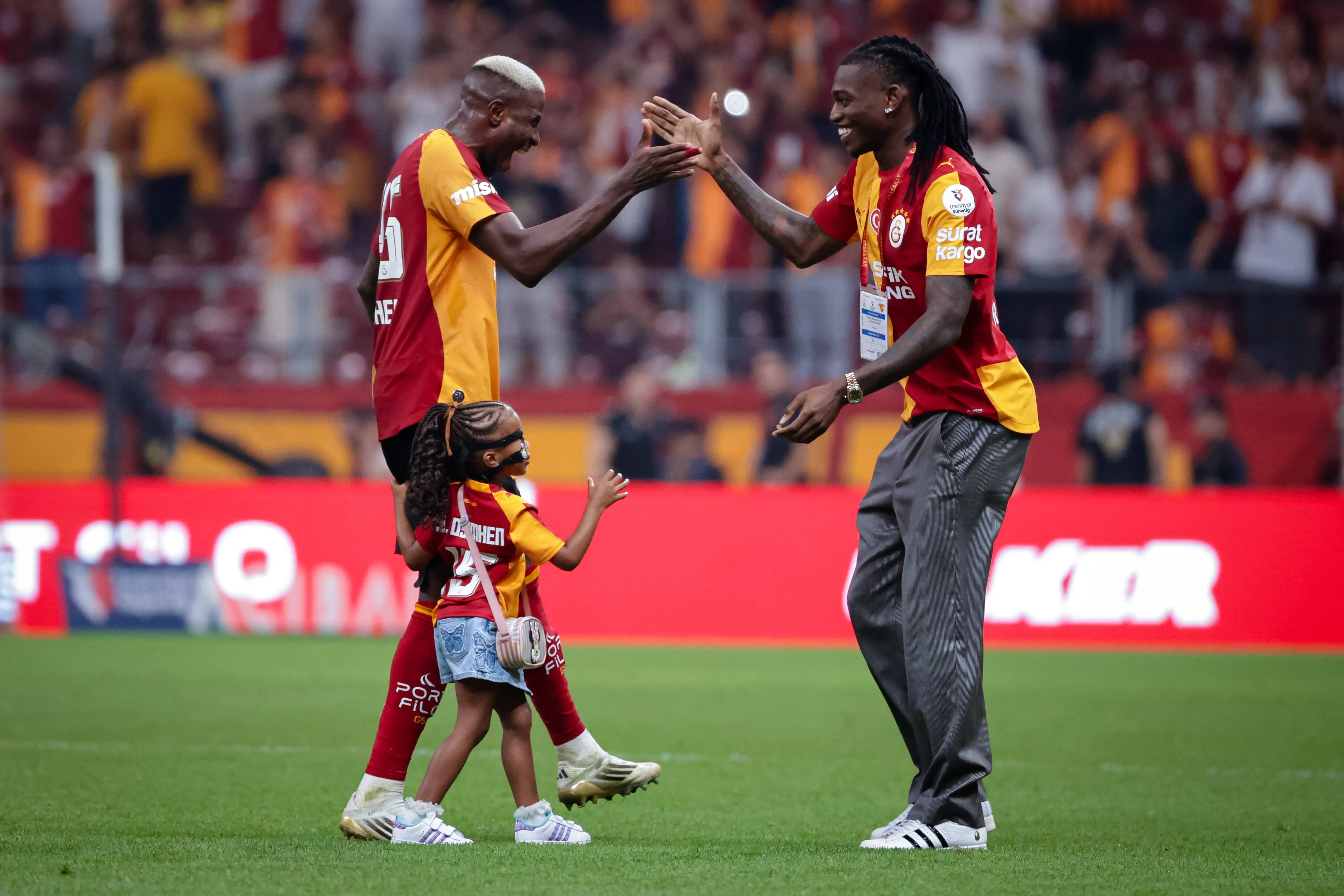 Victor Osimhen of Galatasaray AS welcomes Rafael Leao