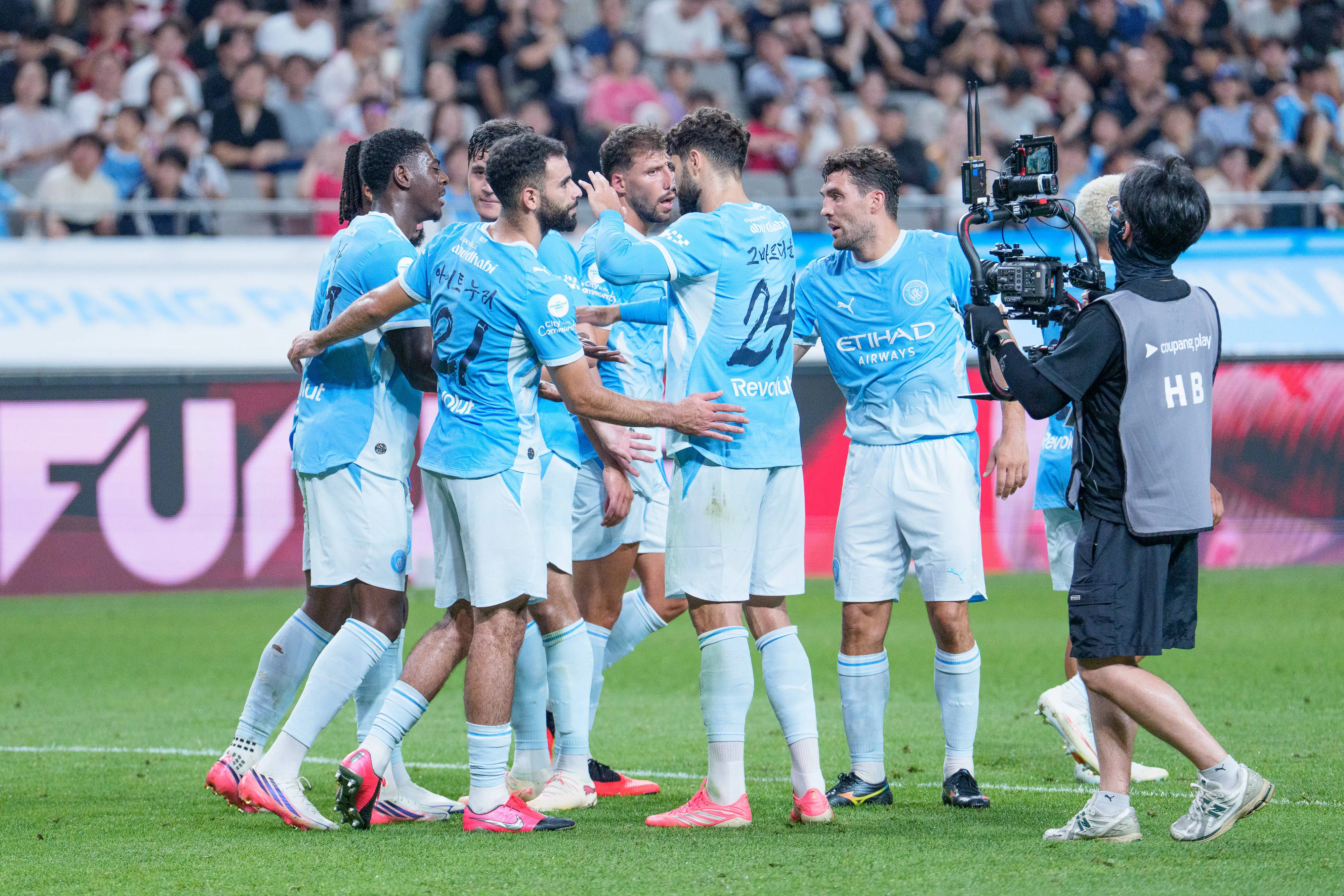 Divin Mubama of Manchester City celebrates his goal with teammates during the 2026 Coupang Play Series football match between Team K League and Manchester City FC at the Seoul World Cup Stadium in Seoul, South Korea, on August 05, 2026. Seoul Seoul World Cup Stadium.