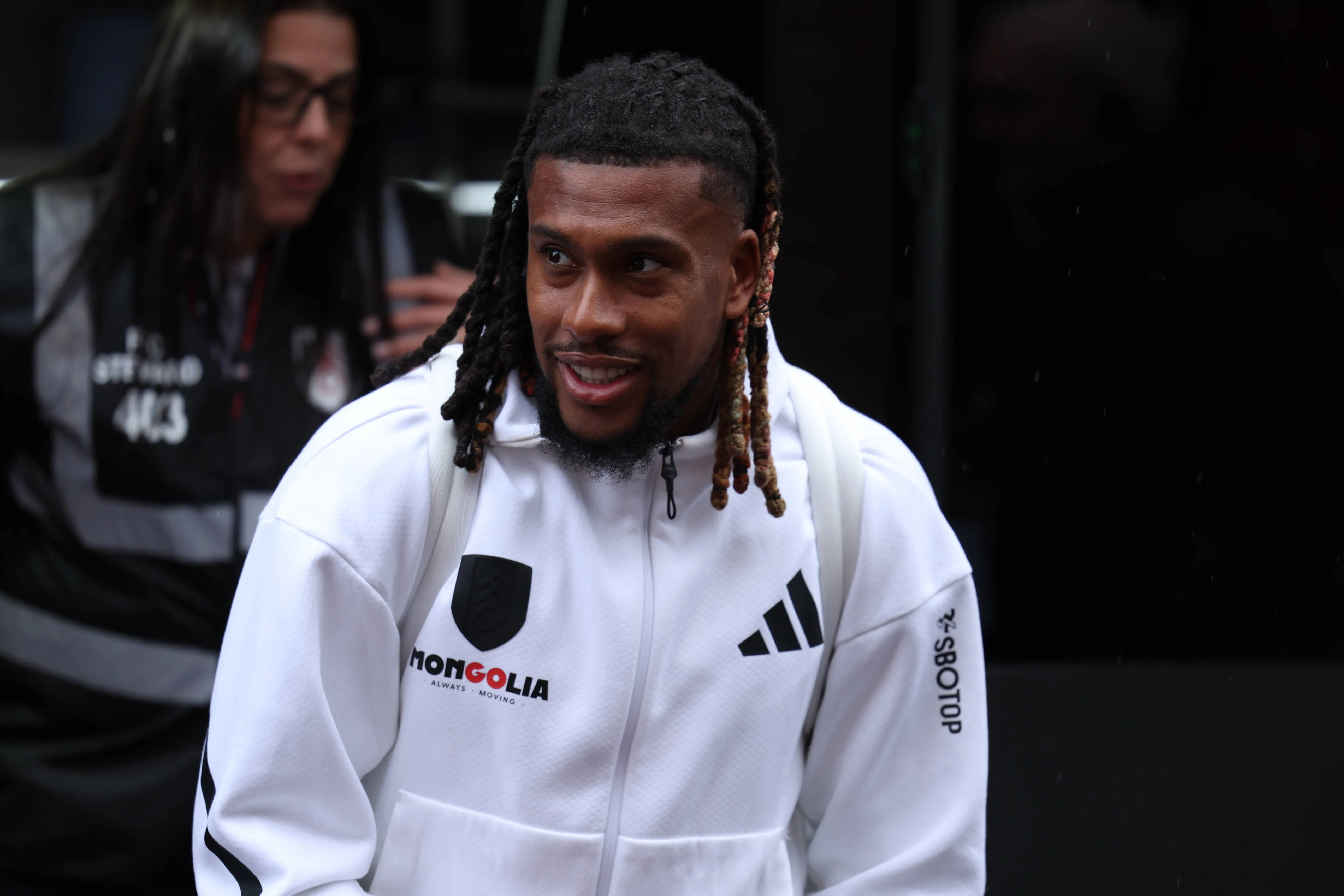 Alex Iwobi arrives at Craven Cottage before the Premier League match between Fulham and Everton