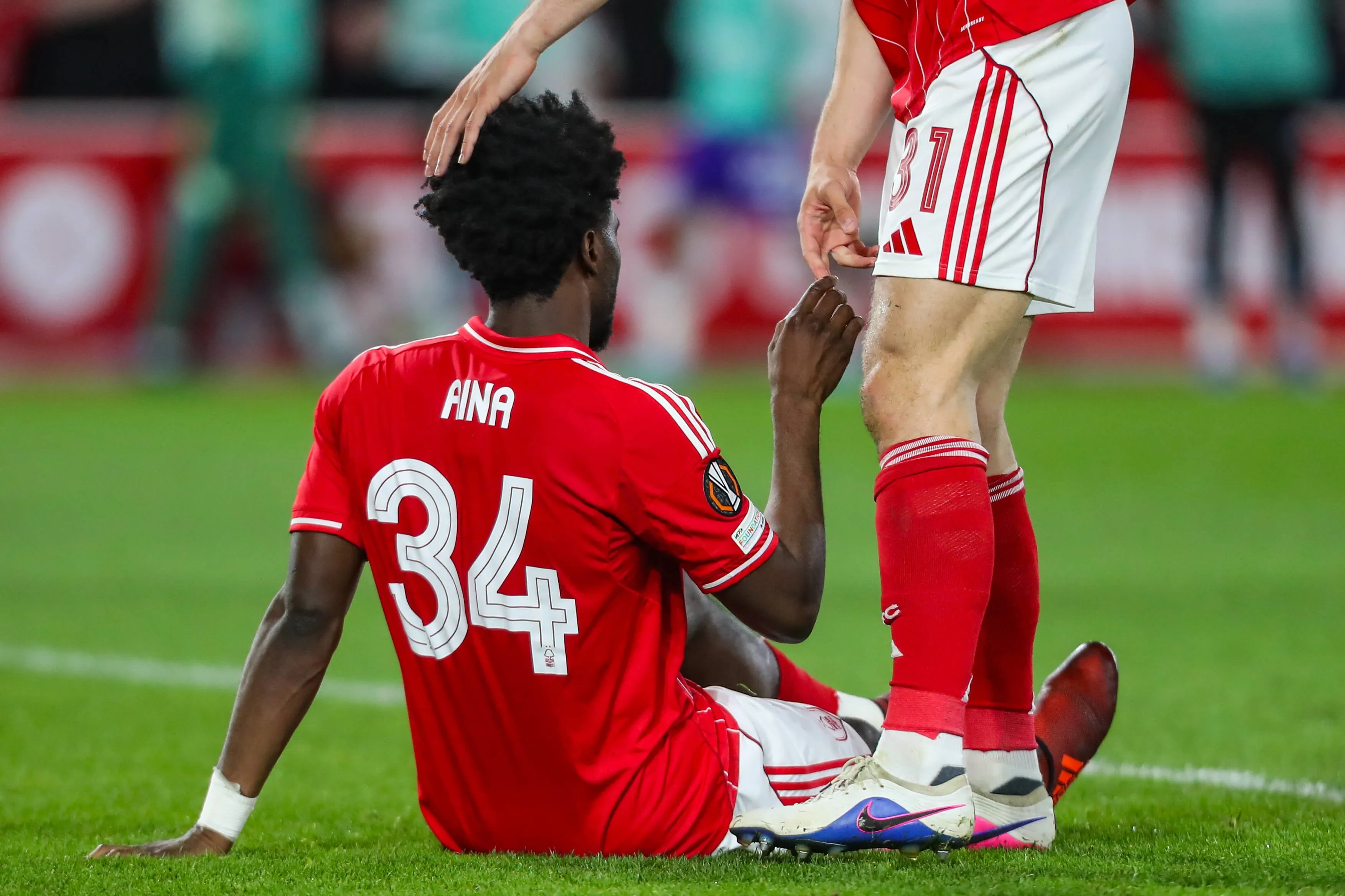  Ola Aina Of Nottingham Forest goes down injured during the Nottingham Forest v Aston Villa UEFA Europa League Semi-Final 1st leg match at the City Ground