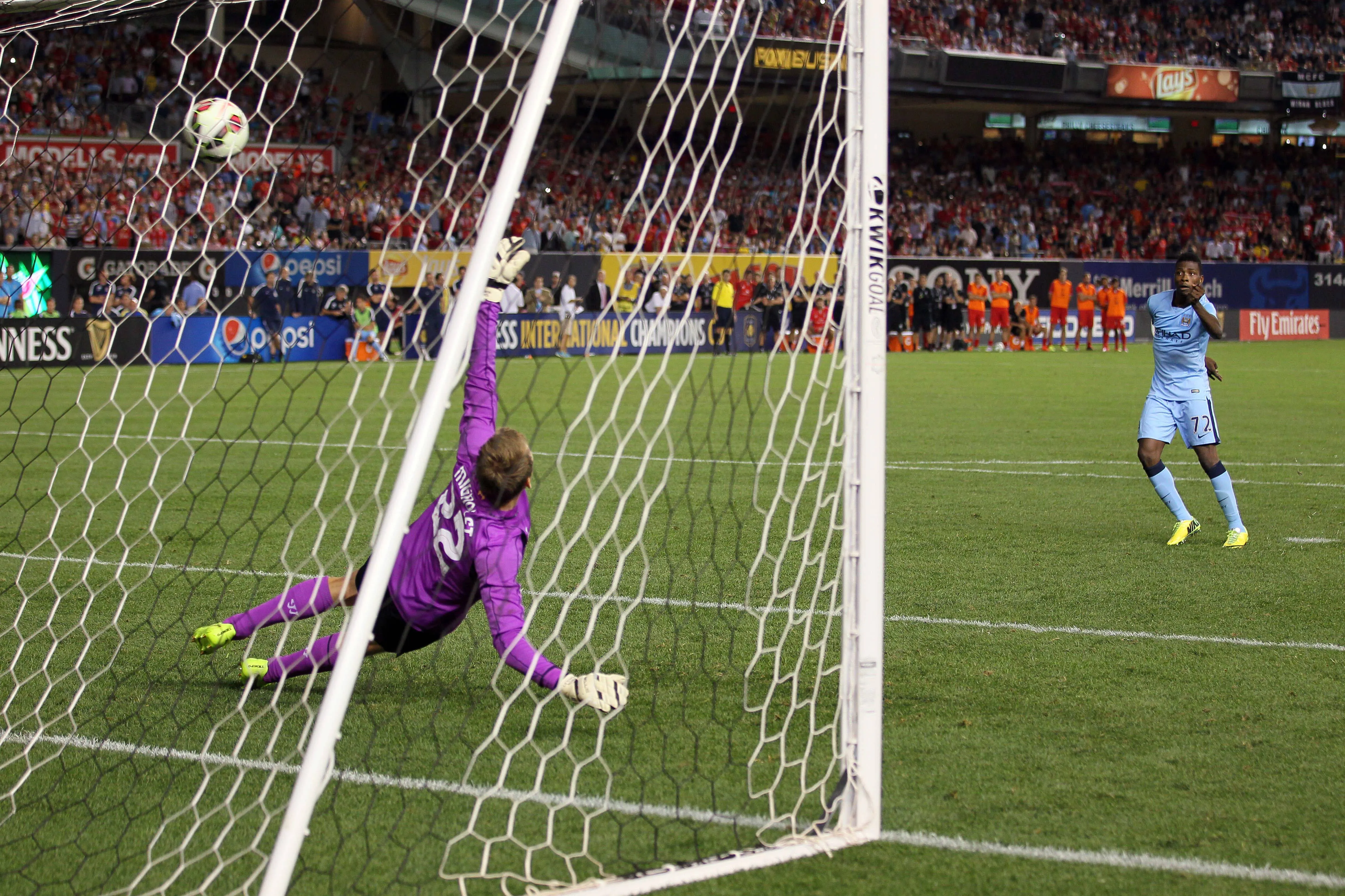 Manchester City's Kelechi Iheanacho scoring his penalty