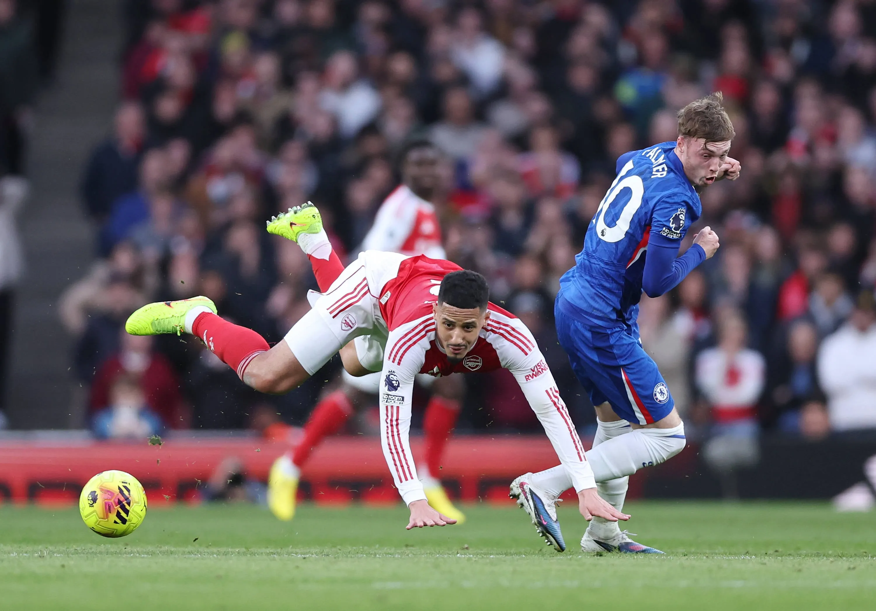 William Saliba and Cole Palmer during the Arsenal vs Chelsea Premier League match at the Emirates Stadium