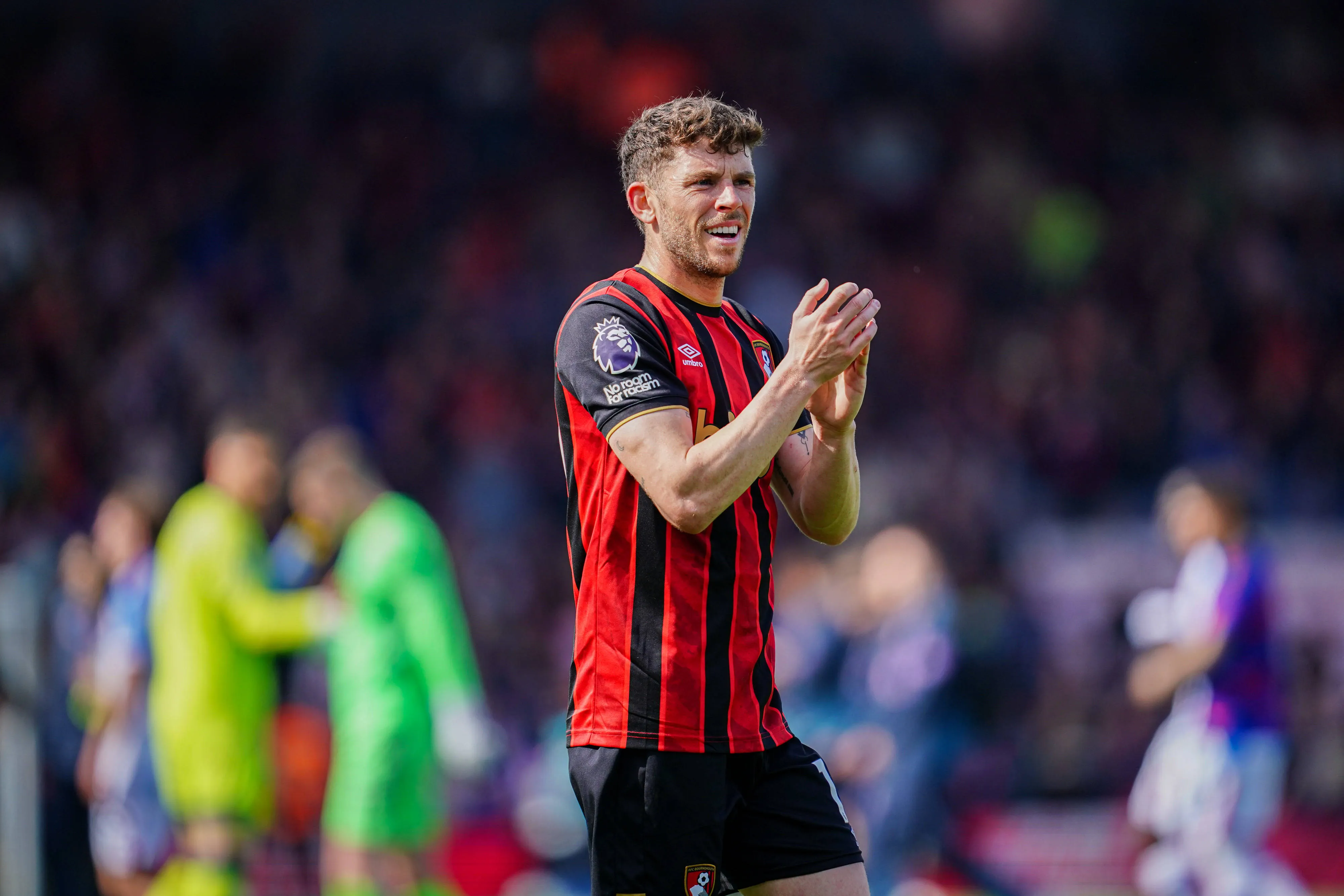 Ryan Christie of Bournemouth applauds the fans