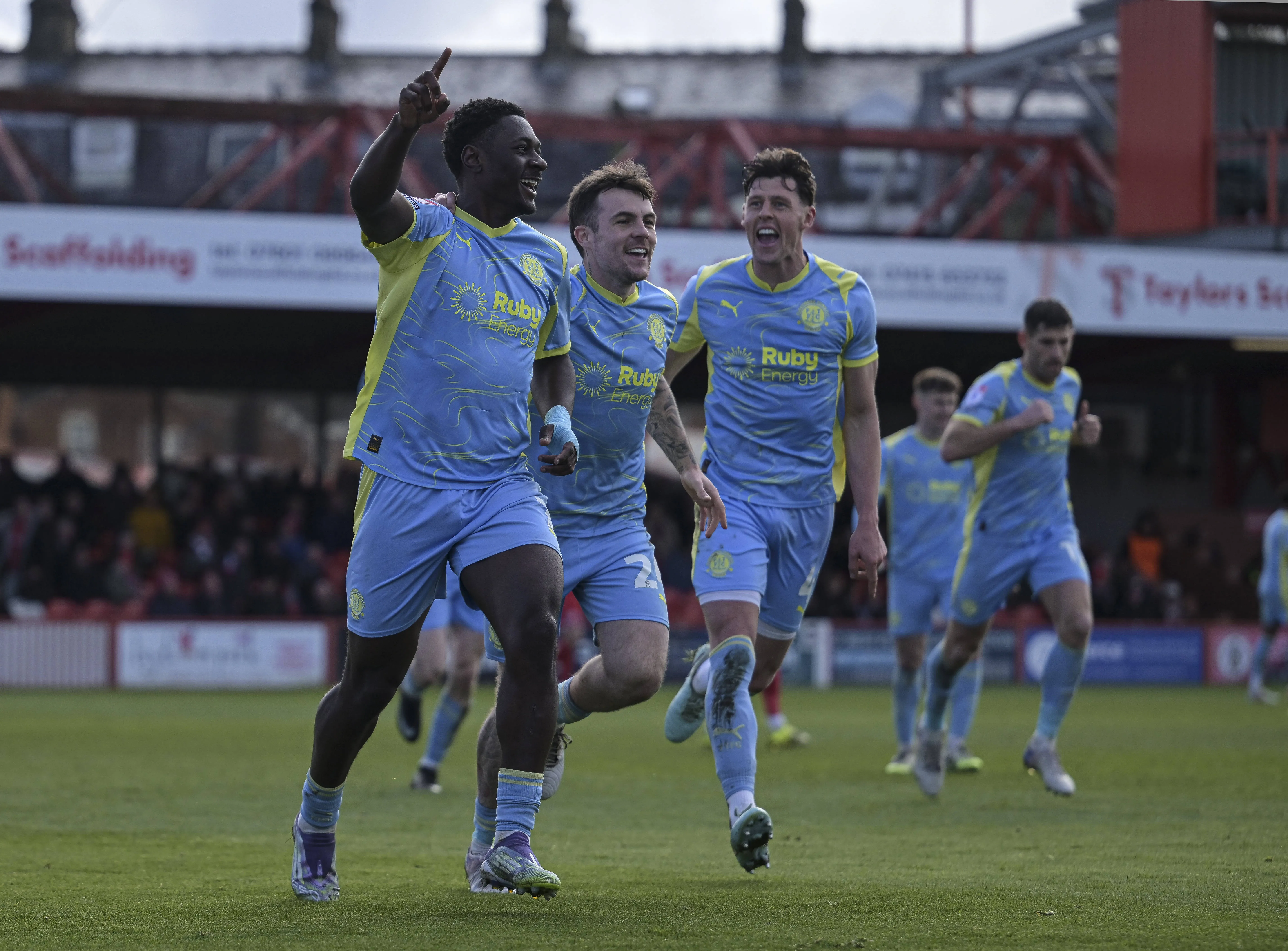 Fleetwood Town players celebrate goal.