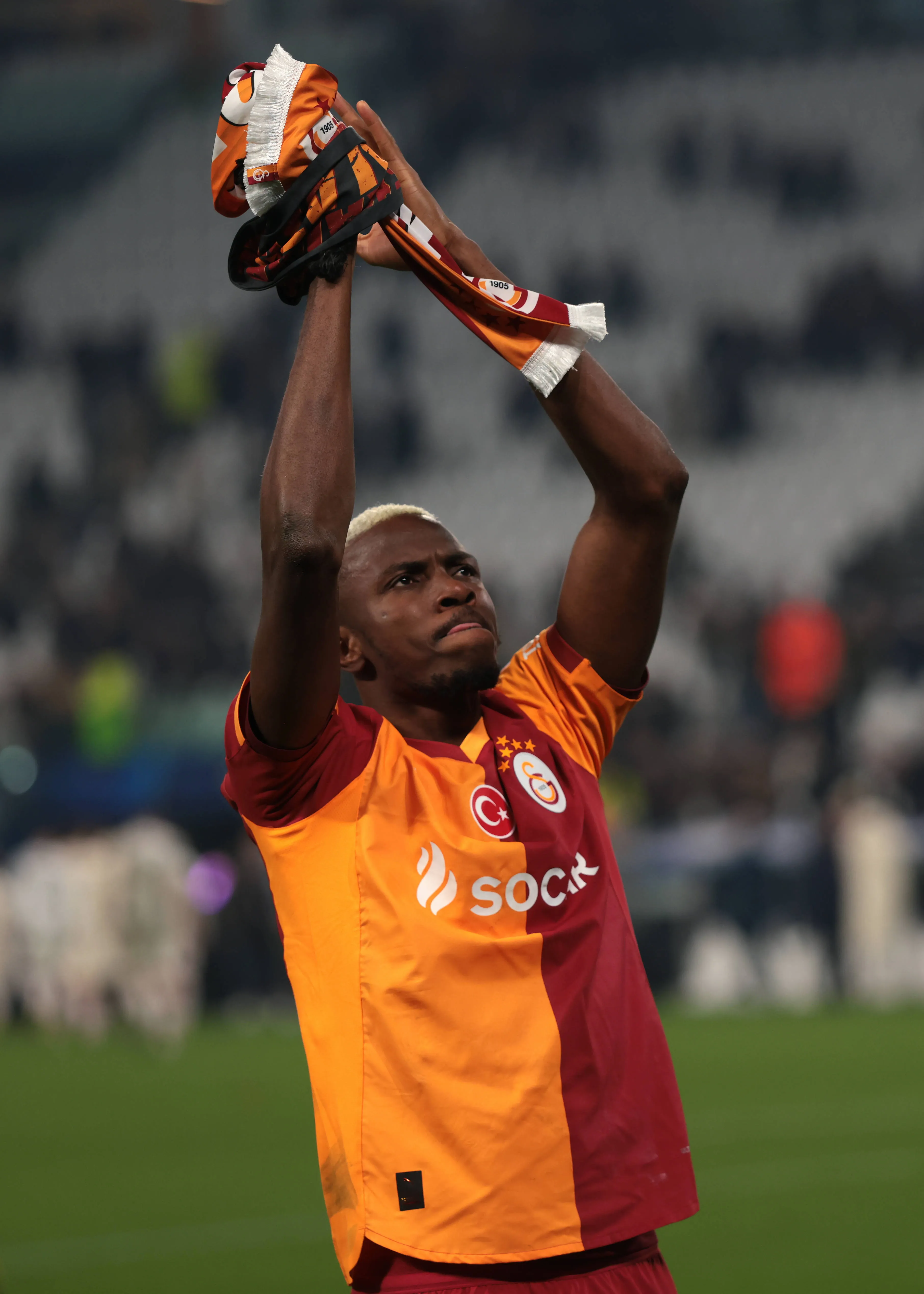 Victor Osimhen of Galatasaray SK salutes the fans following the final whistle of the Juventus vs Galatasaray UEFA Champions League Play Off 2nd Leg match at Juventus Stadium, Turin