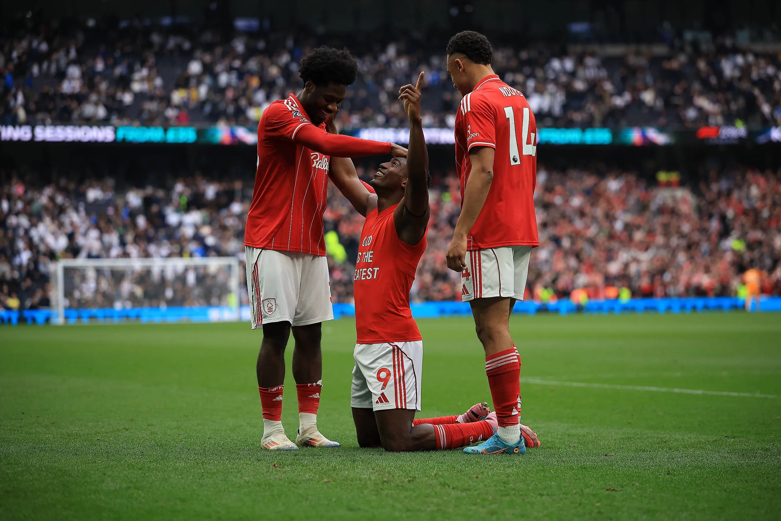 Taiwo Awoniyi, Ola Aina and Dan Ndoye celebrating a goal for Nottingham Forest against Tottenham Hotspur at the London Stadium
