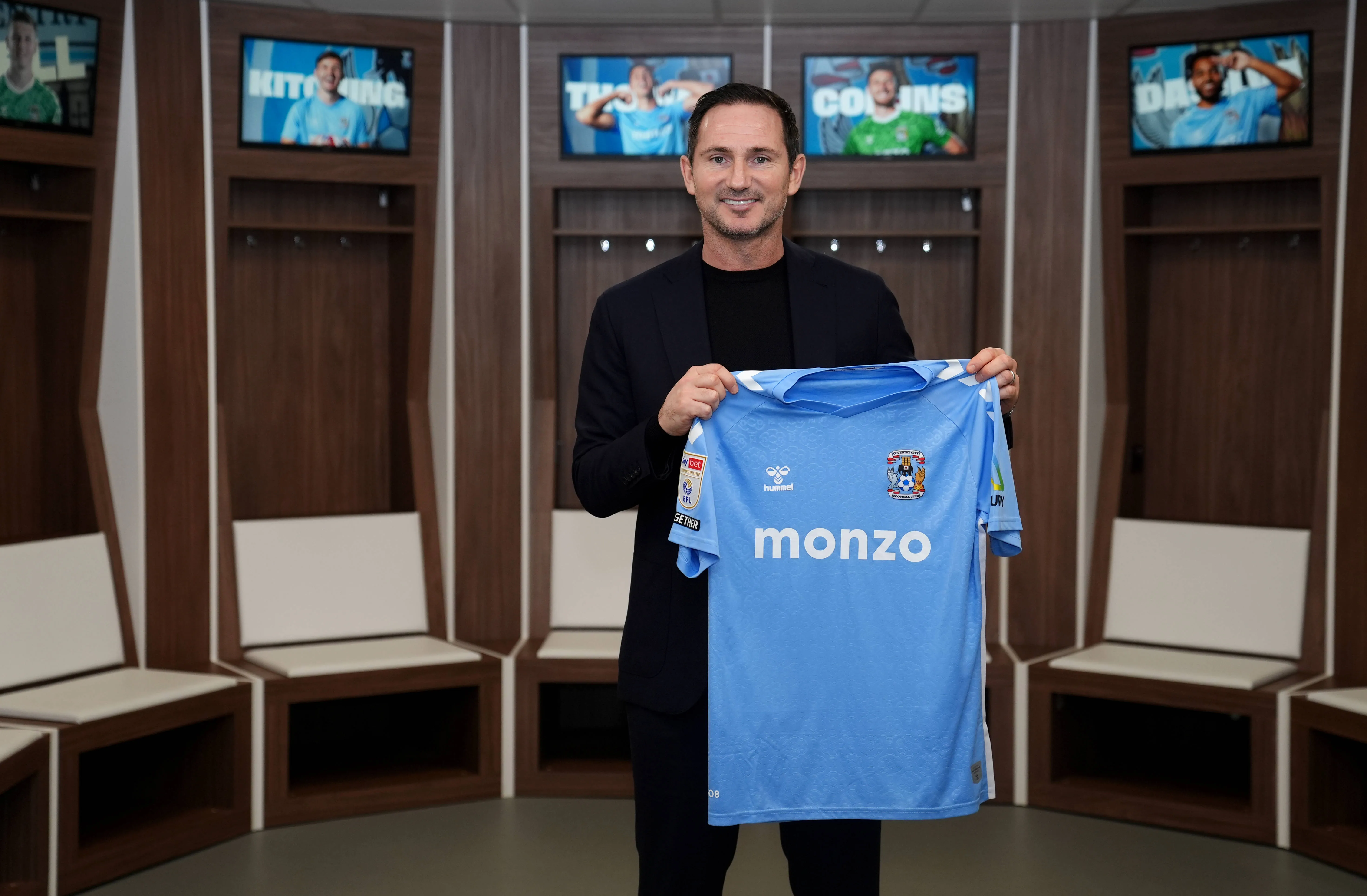 Frank Lampard poses in the home changing room