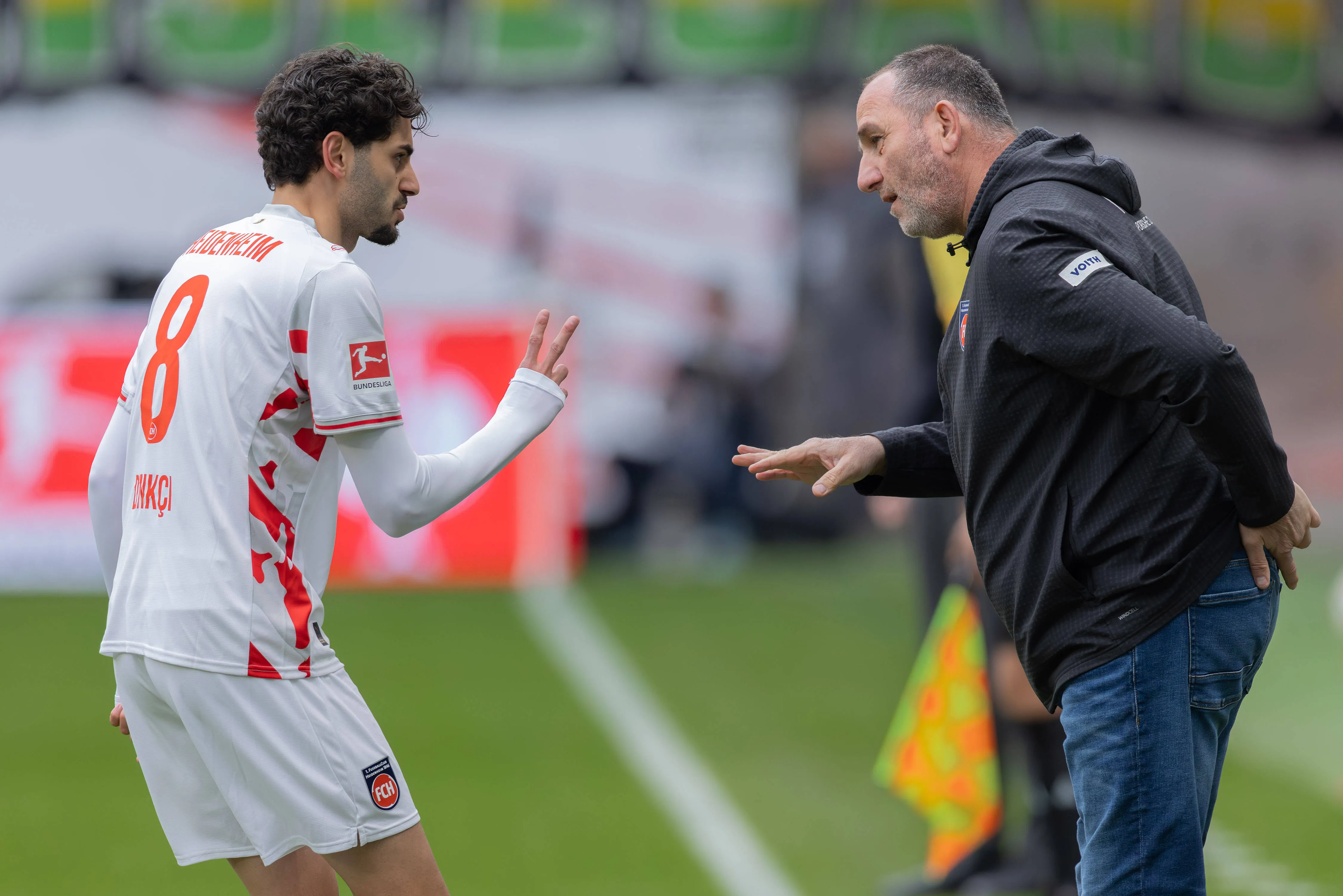 Eren Dinkci and coach Frank Schmidt of Heidenheim