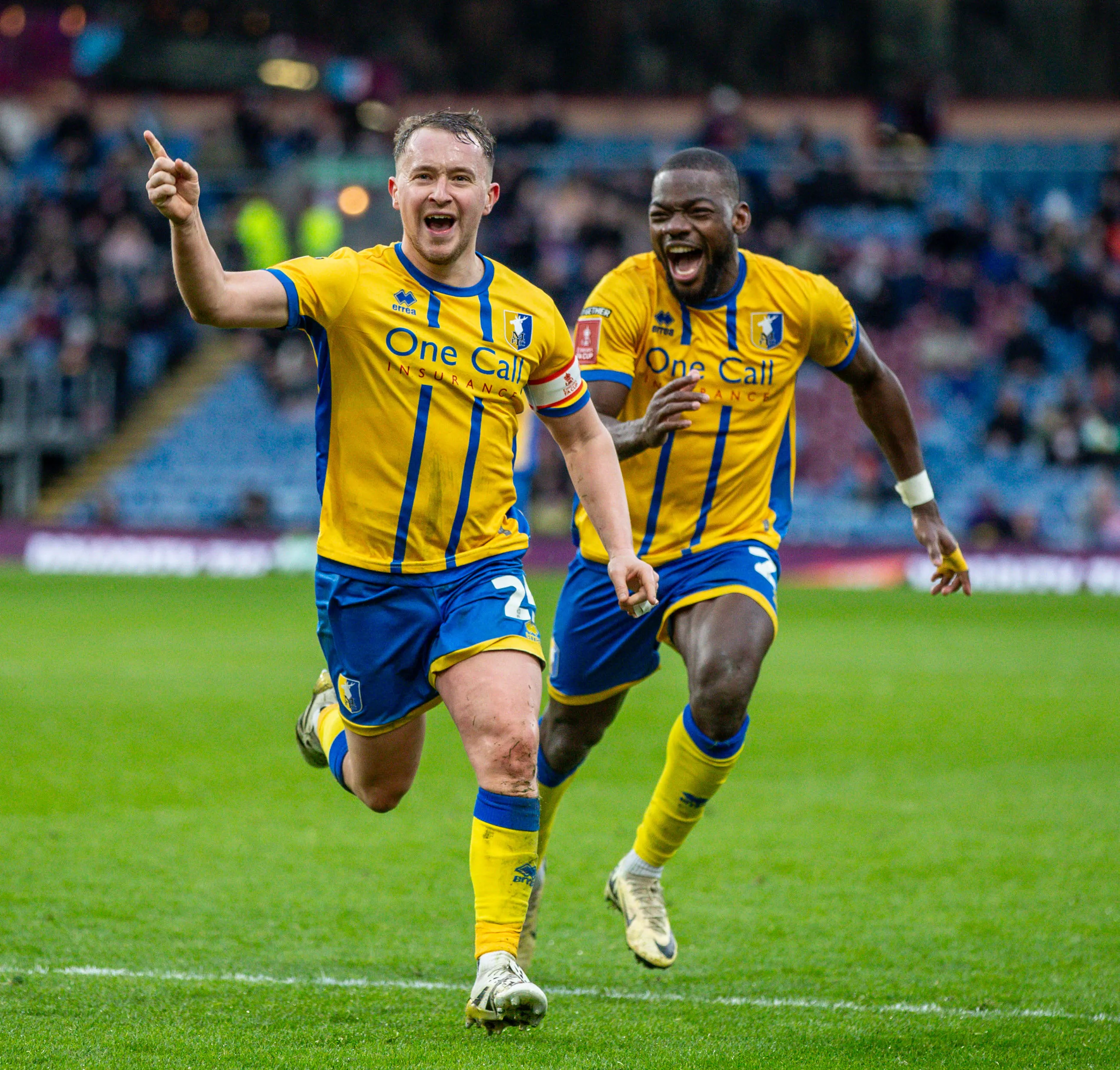 Louis Reed of Mansfield Town celebrates after scoring his sides second goal