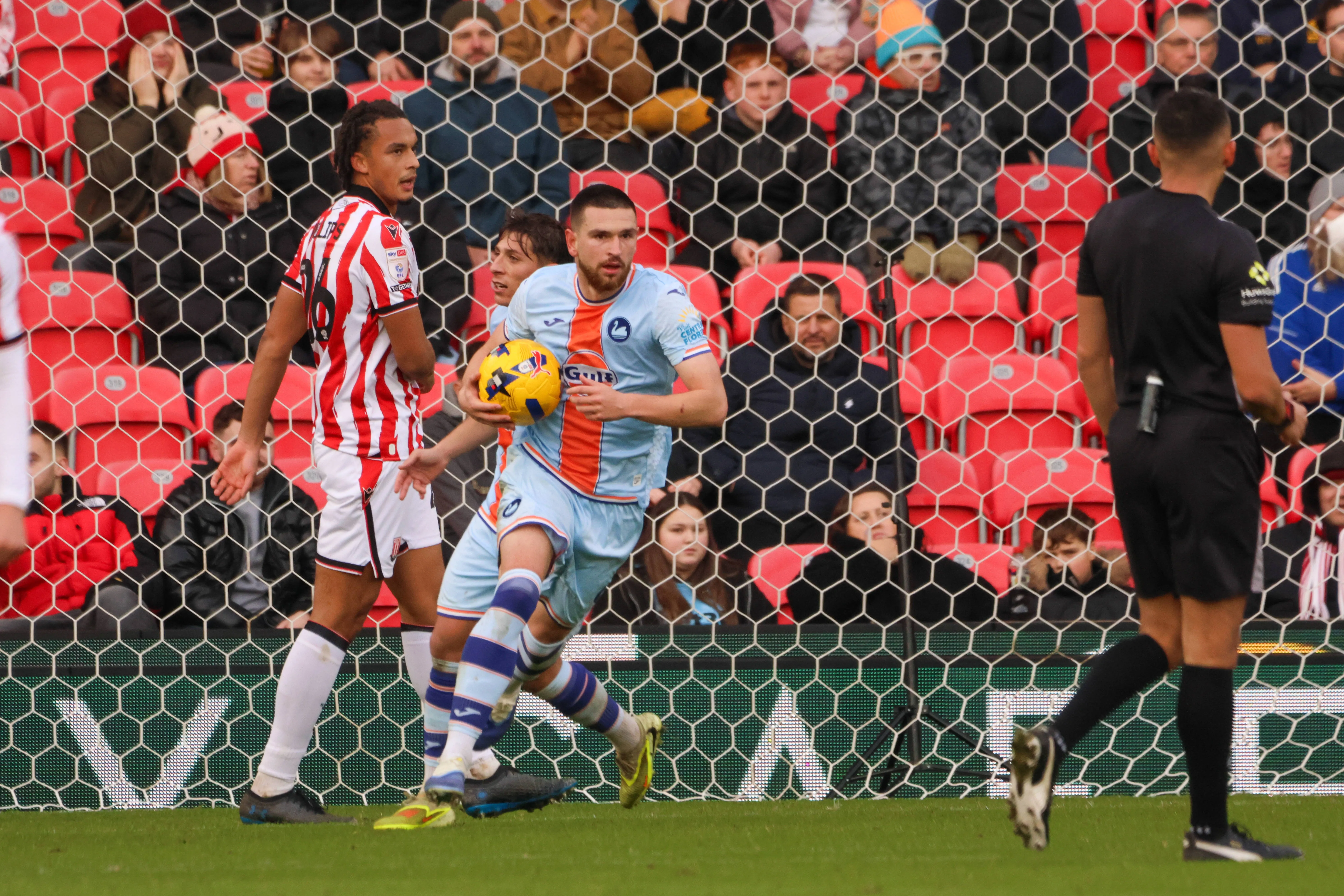 Swansea City's Zan Vipotnik scores goal to make it 2-1 and runs back with the ball. 