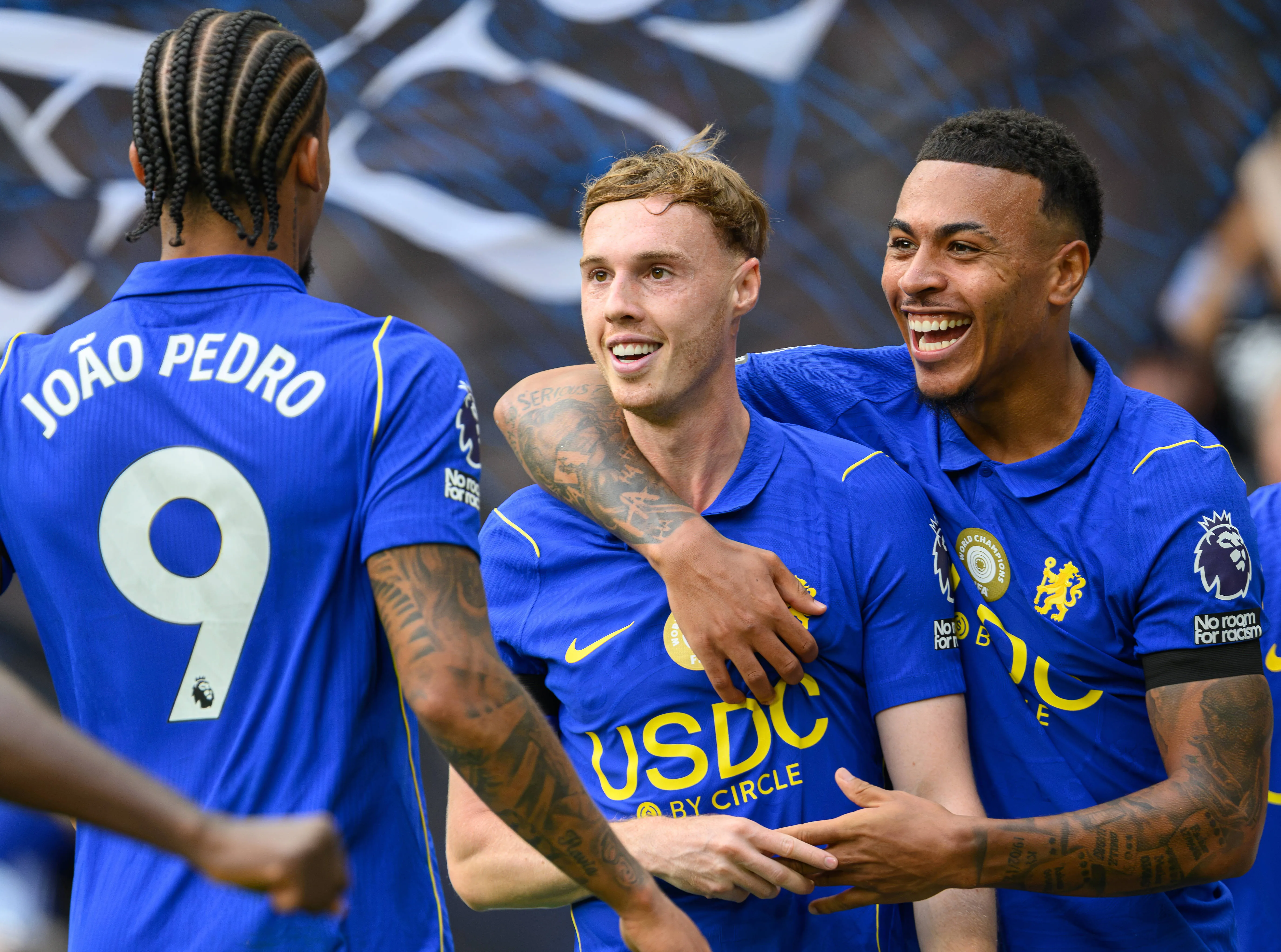 Chelsea's Cole Palmer celebrates his winning goal with Morgan Rogers and Joao Pedro.