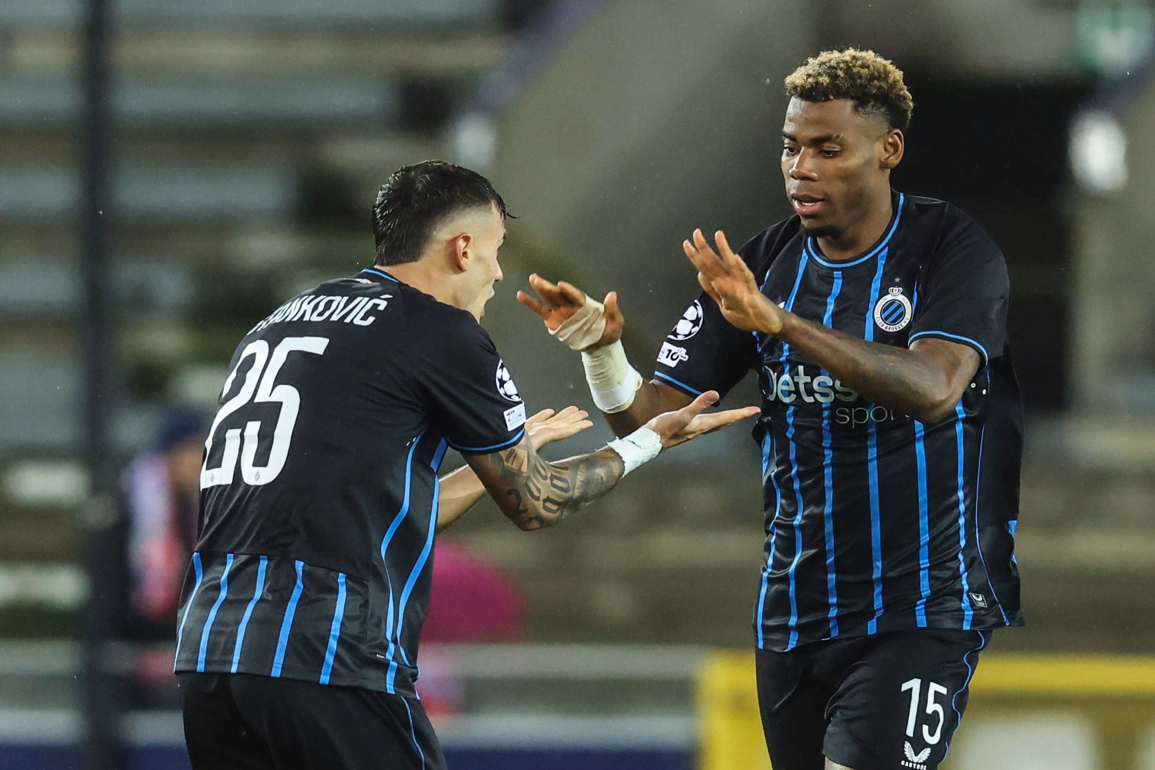 Raphael Onyedika celebrates after scoring during a soccer game between Belgian Club Brugge KV and Spanish Atletico de Madrid