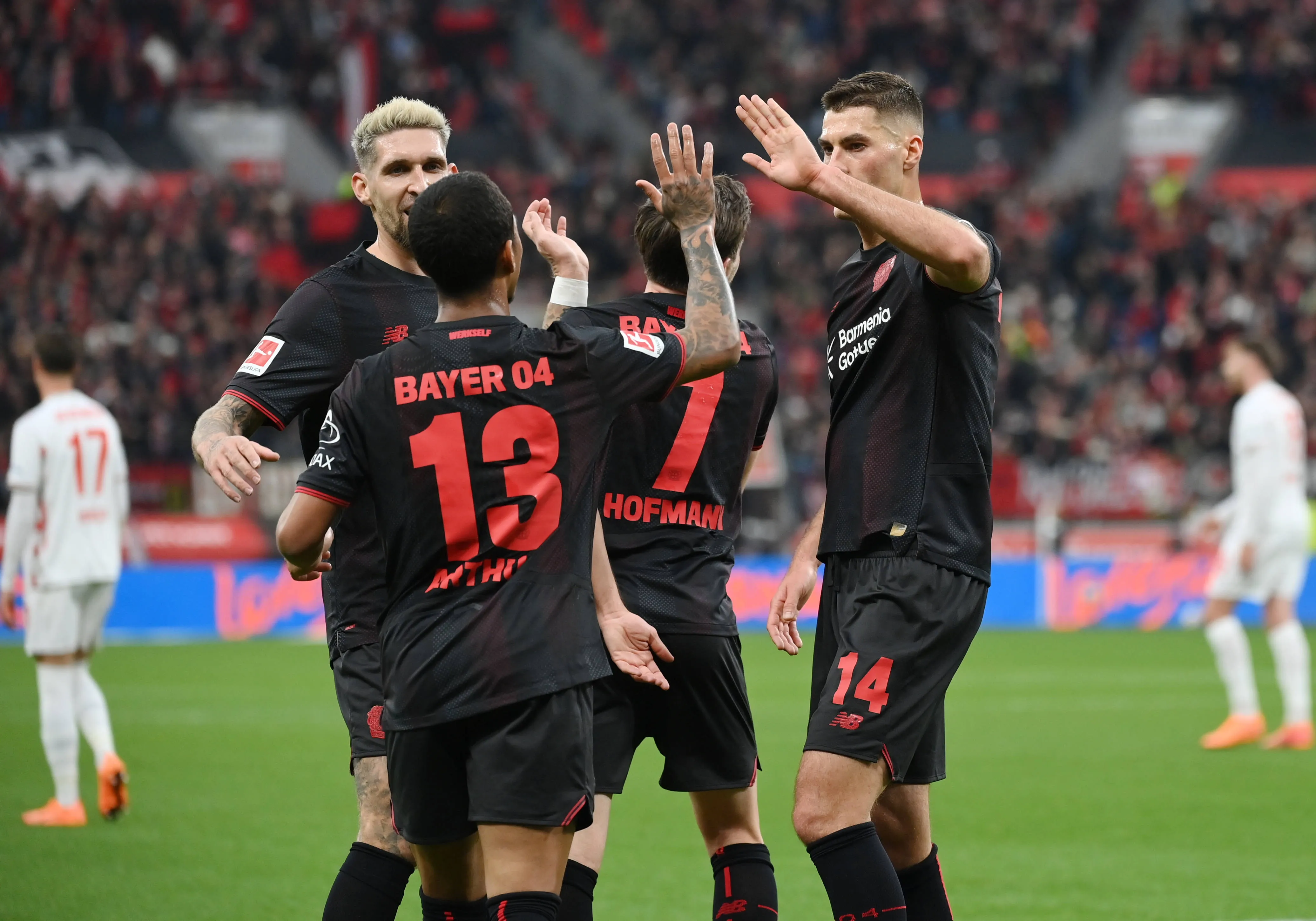 Bayer 04 Leverkusen players celebrate their 6-0 win over Heidenheim