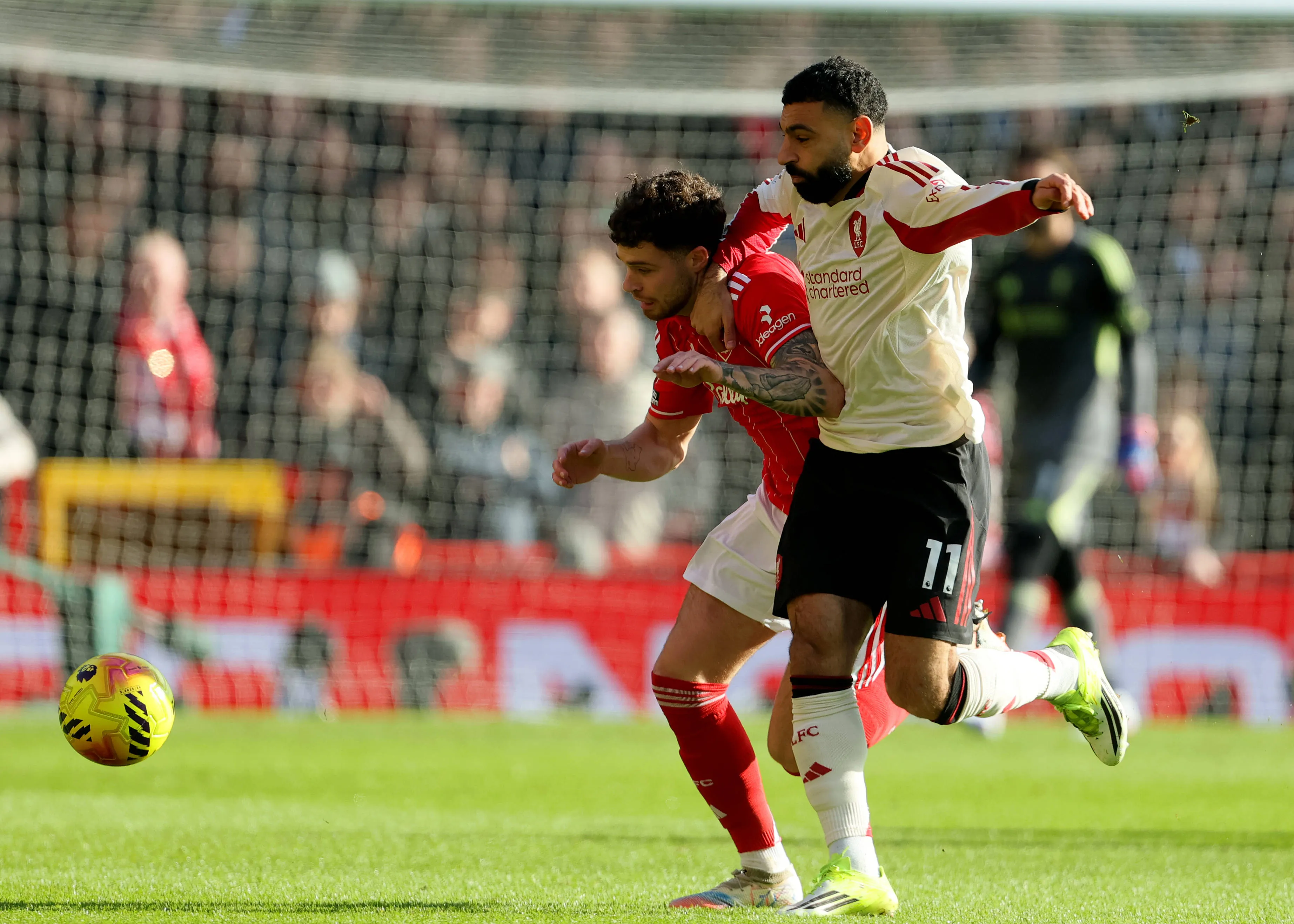 Neco Williams of Nottingham Forest and Mohamed Salah of Liverpool.