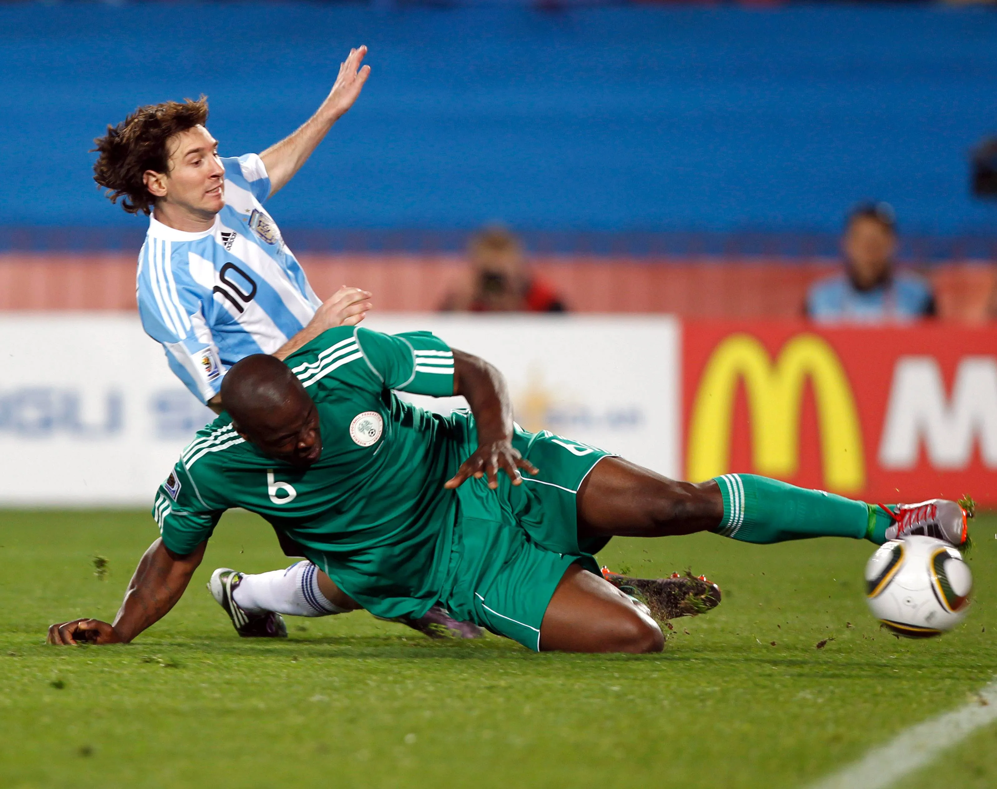 Danny Shittu and Lionel Messi