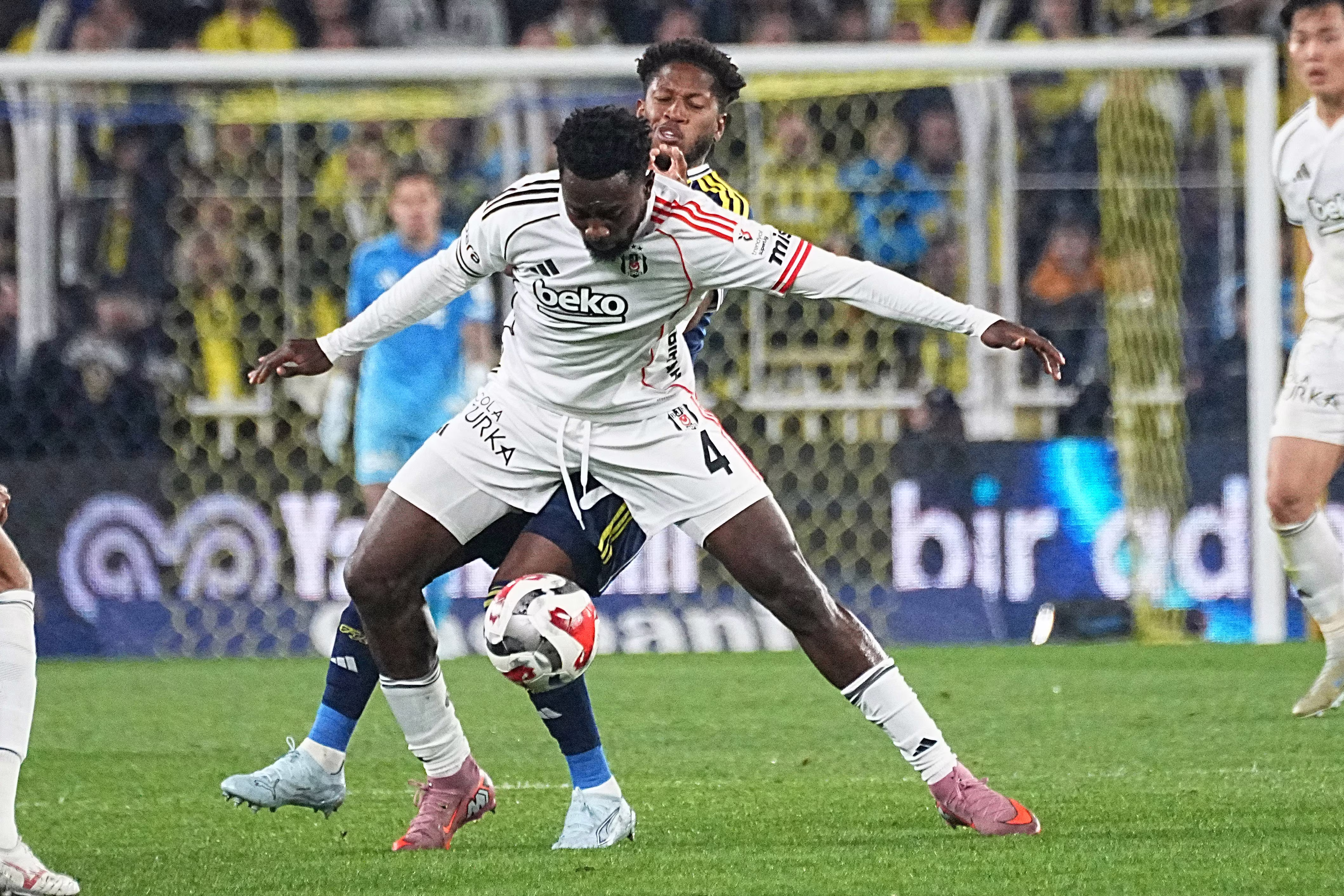 Fred back of Fenerbahce and Wilfred Ndidi 4 of Besiktas during the Trendyol Turkish S&uuml;per League match between Fenerbahce SK and Besiktas JK at Chobani Stadium on April 5, 2026