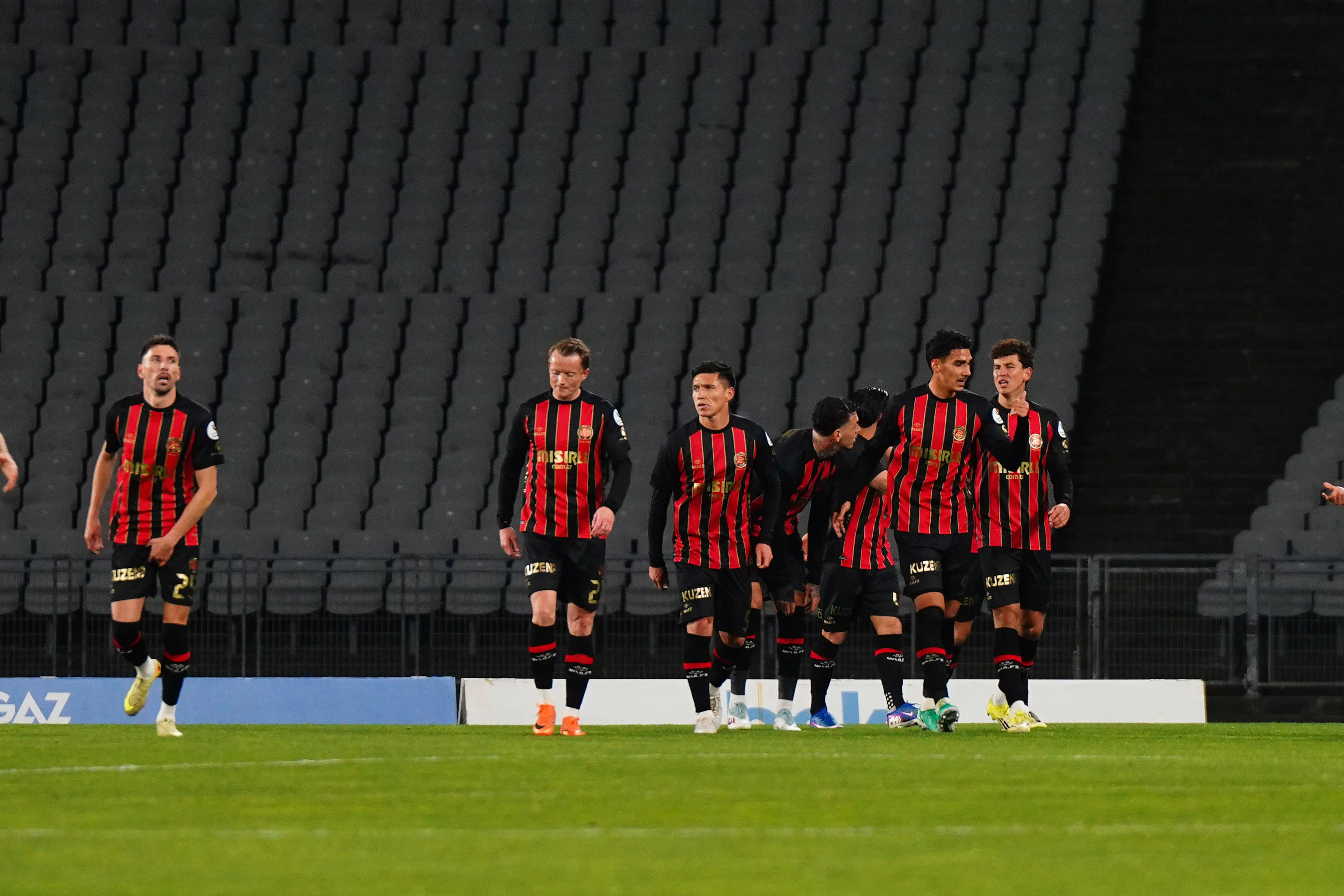 Bartug Elmaz of Fatih Karagumruk celebrates after scoring the first goal of his team with teammates during the Trendyol Turkish S&uuml;per League match between Fatih Karagumruk SK and Fenerbahce SK at Ataturk Olympic Stadium on March 13, 2026 in Istanbul, Turkey.