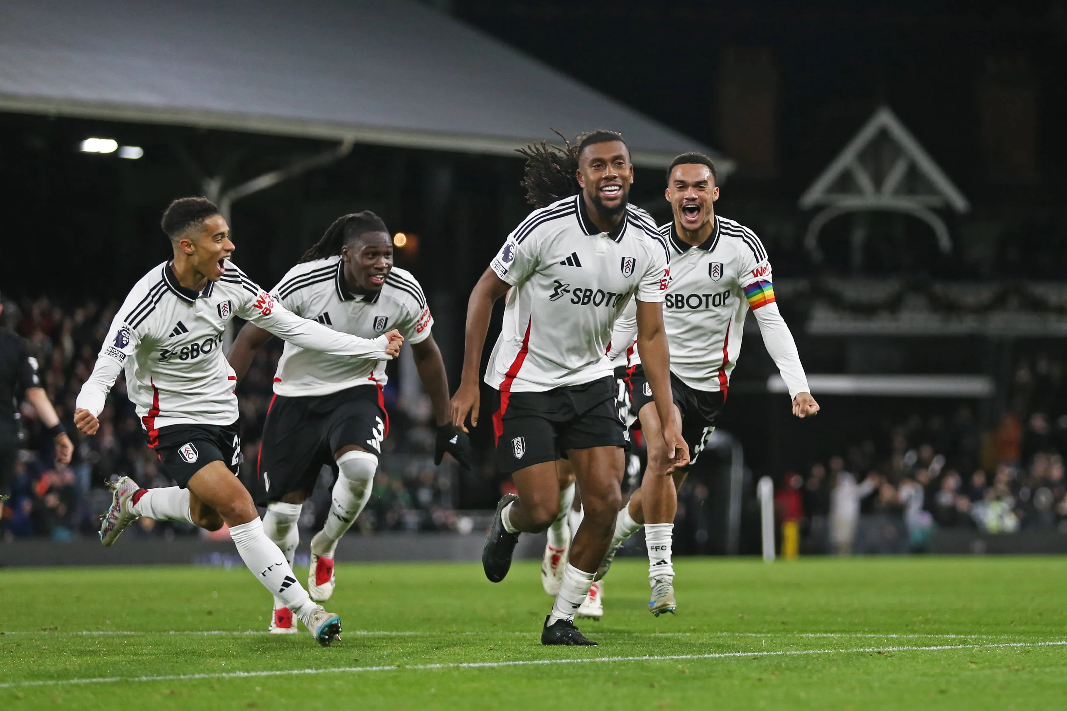  Joshua King, Calvin Bassey, Alex Iwobi and Antonee Robinson of Fulham goal celebration