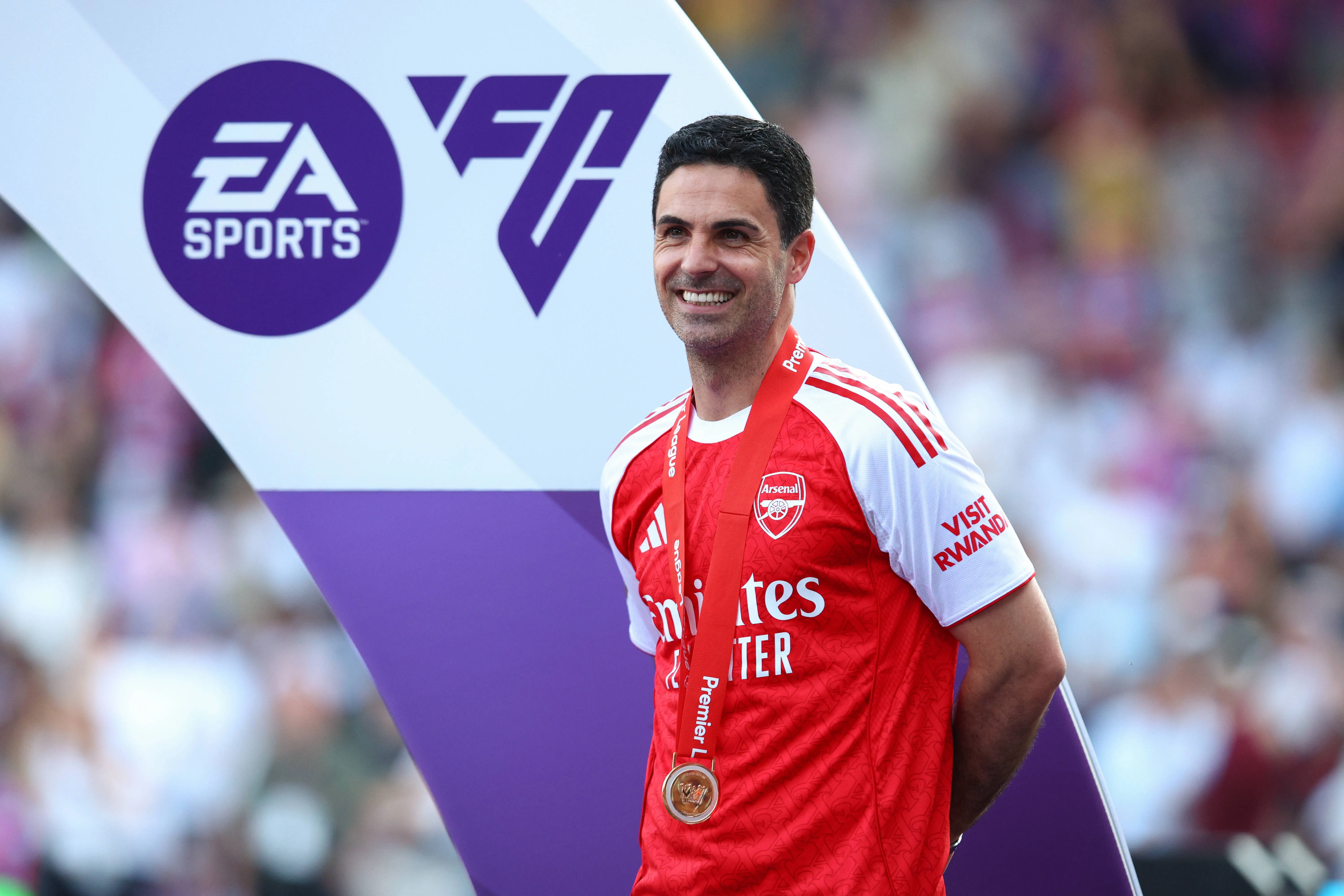 Arsenal manager Mikel Arteta with his winners medal after the Premier League match against Crystal Palace