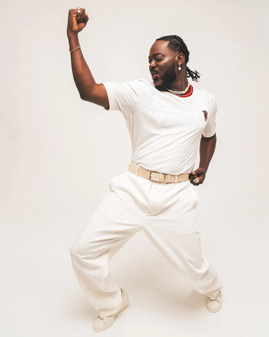 Adekunle Gold models Manchester United's 'LFSTLR' collection