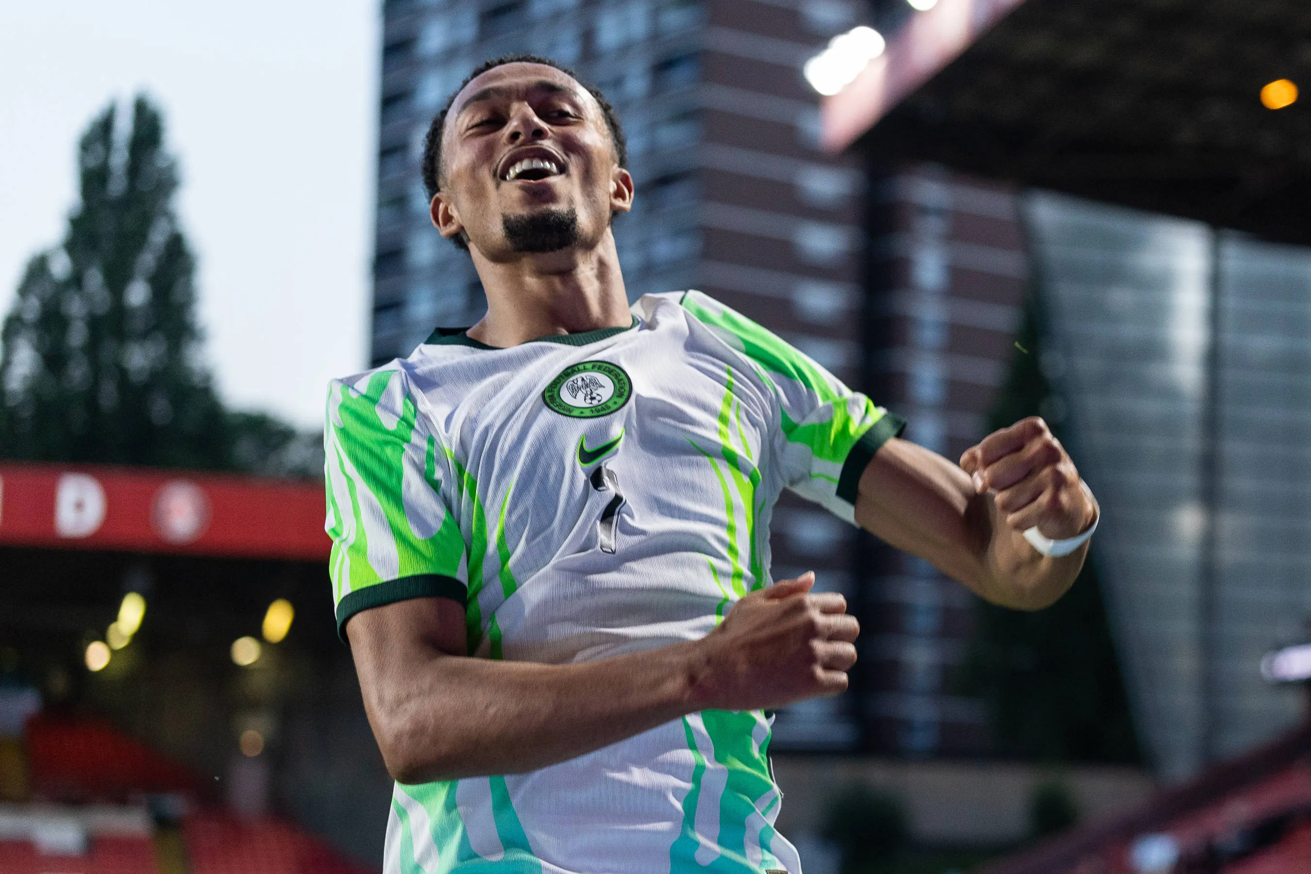 Super Eagles star Femi Azeez celebrates