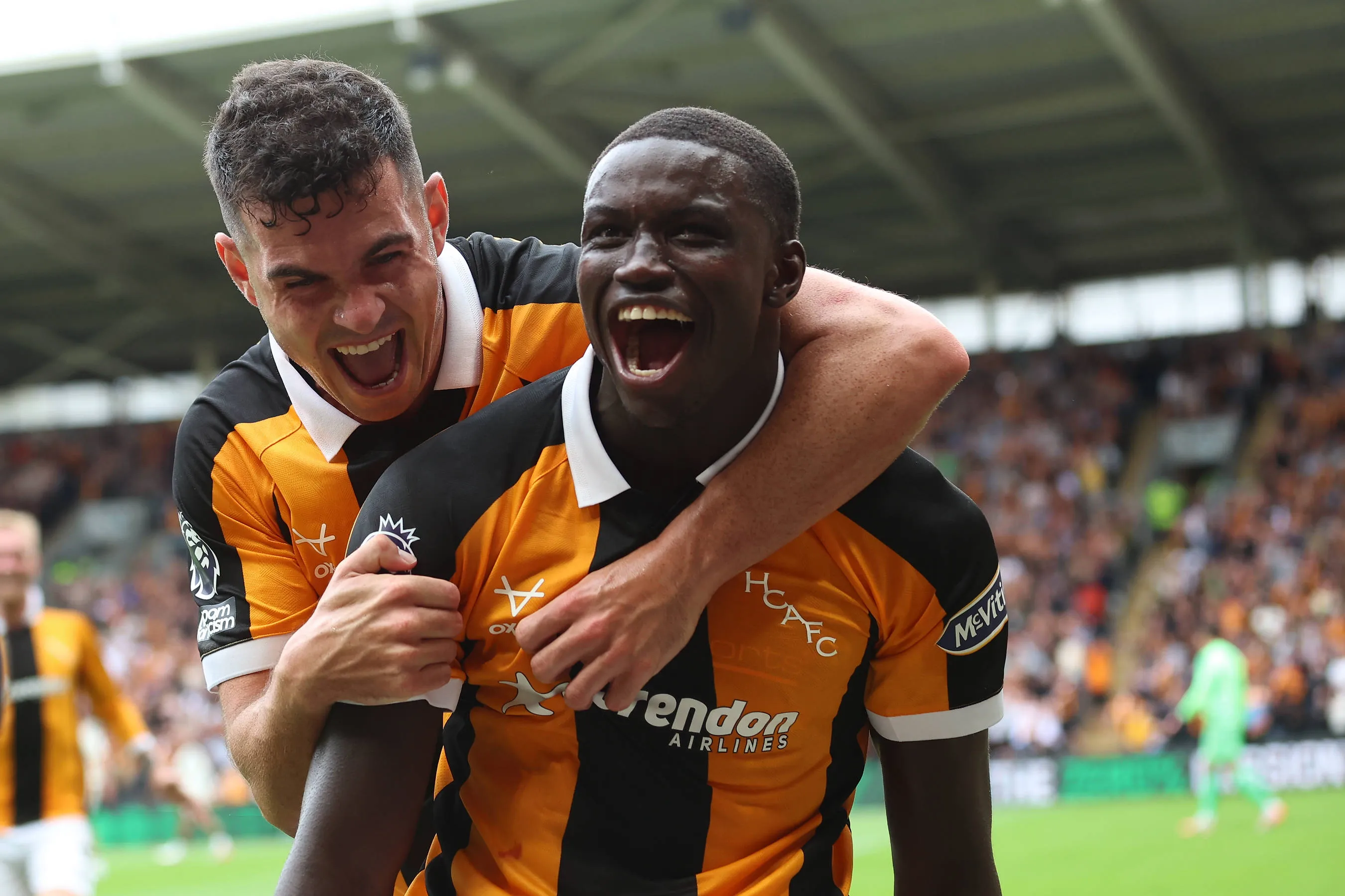 Hull City's Nobel Mendy celbrates scoring with John Egan