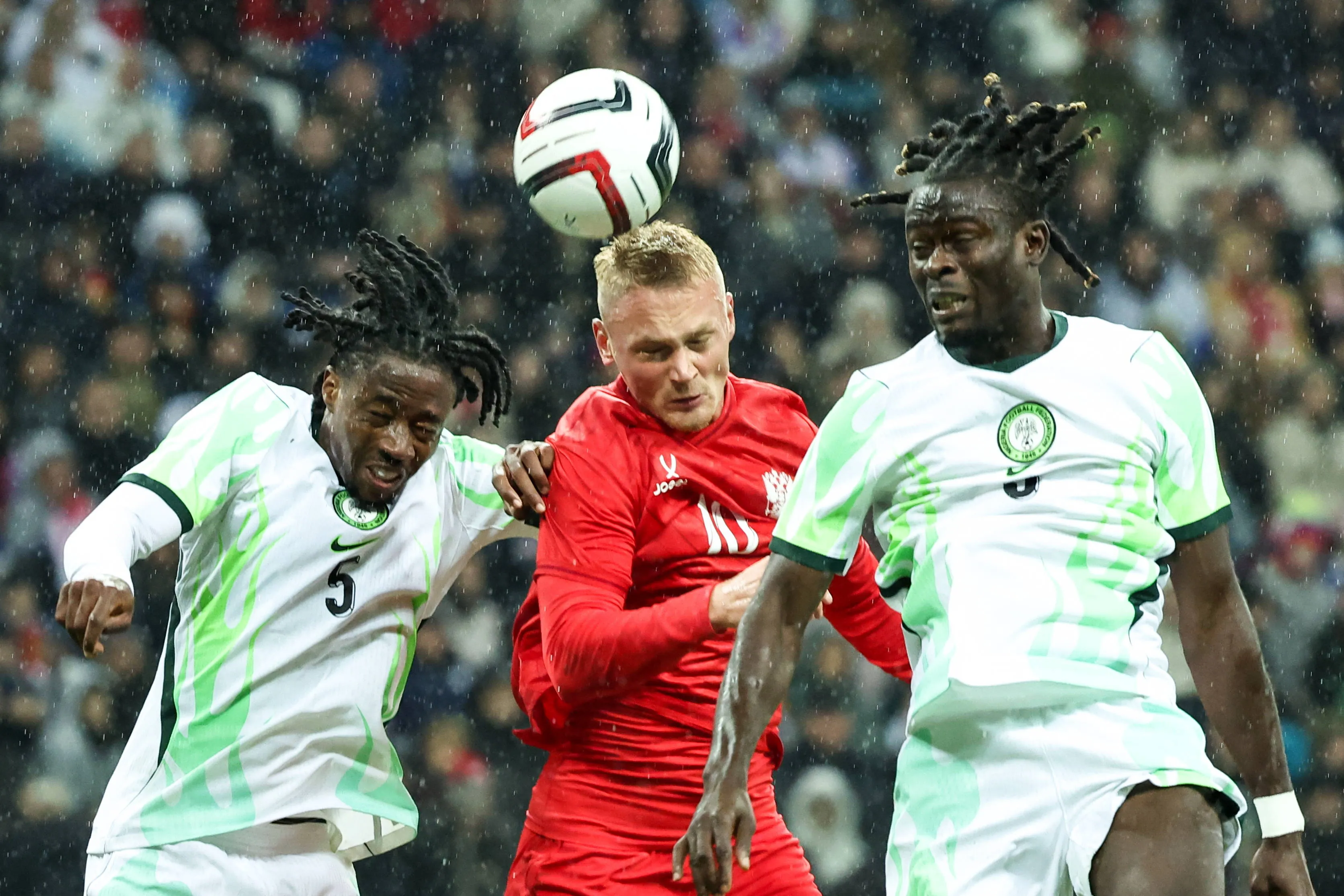 Nigeria's Benjamin Fredrick, Russia's Konstantin Tyukavin and Nigeria's Isaac James