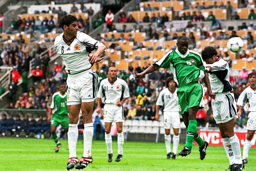 Ex Super Eagles star Mutiu Adepoju scores in a match between Spain and Nigeria