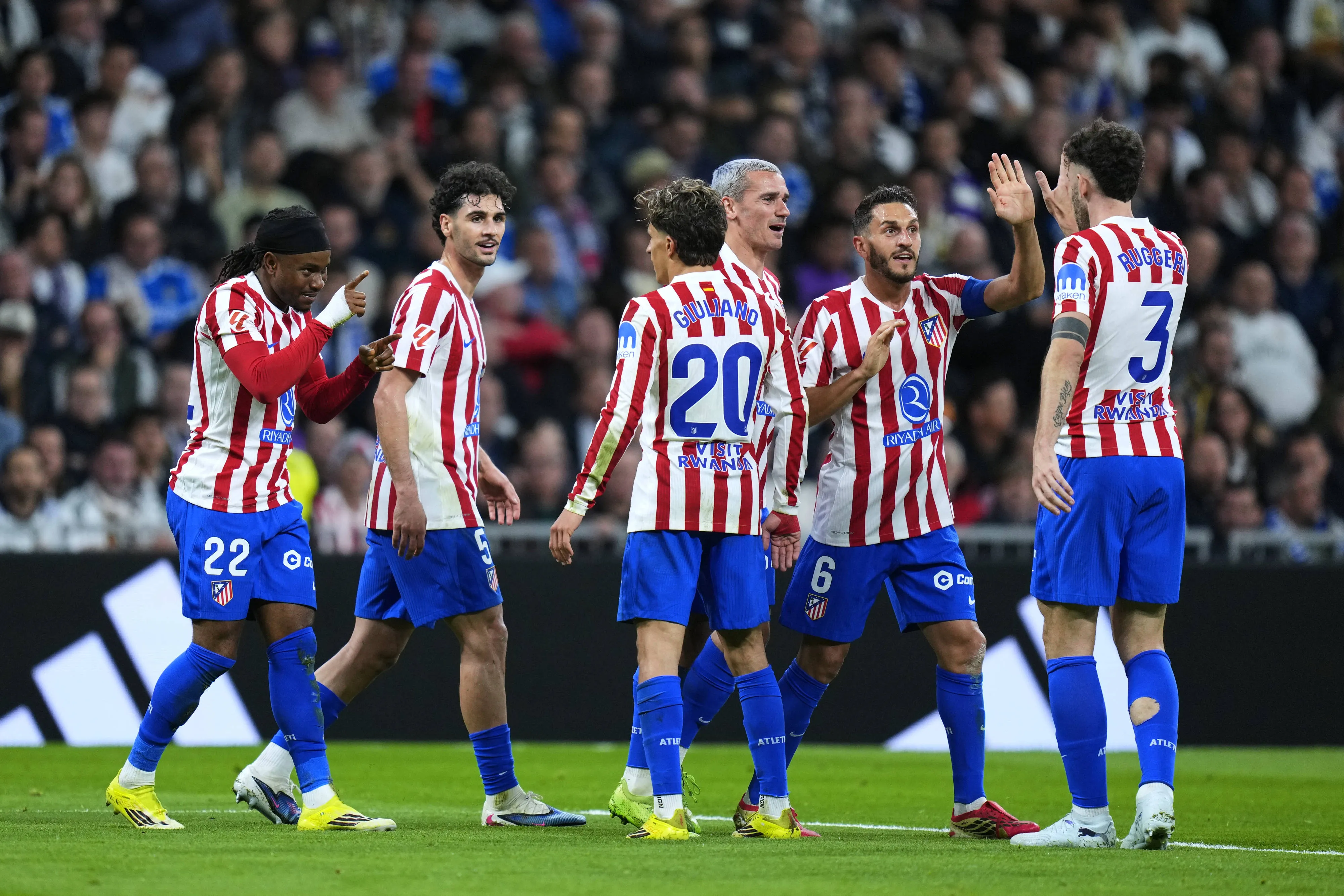  Ademola Lookman of Atletico Madrid celebrates with his teammates