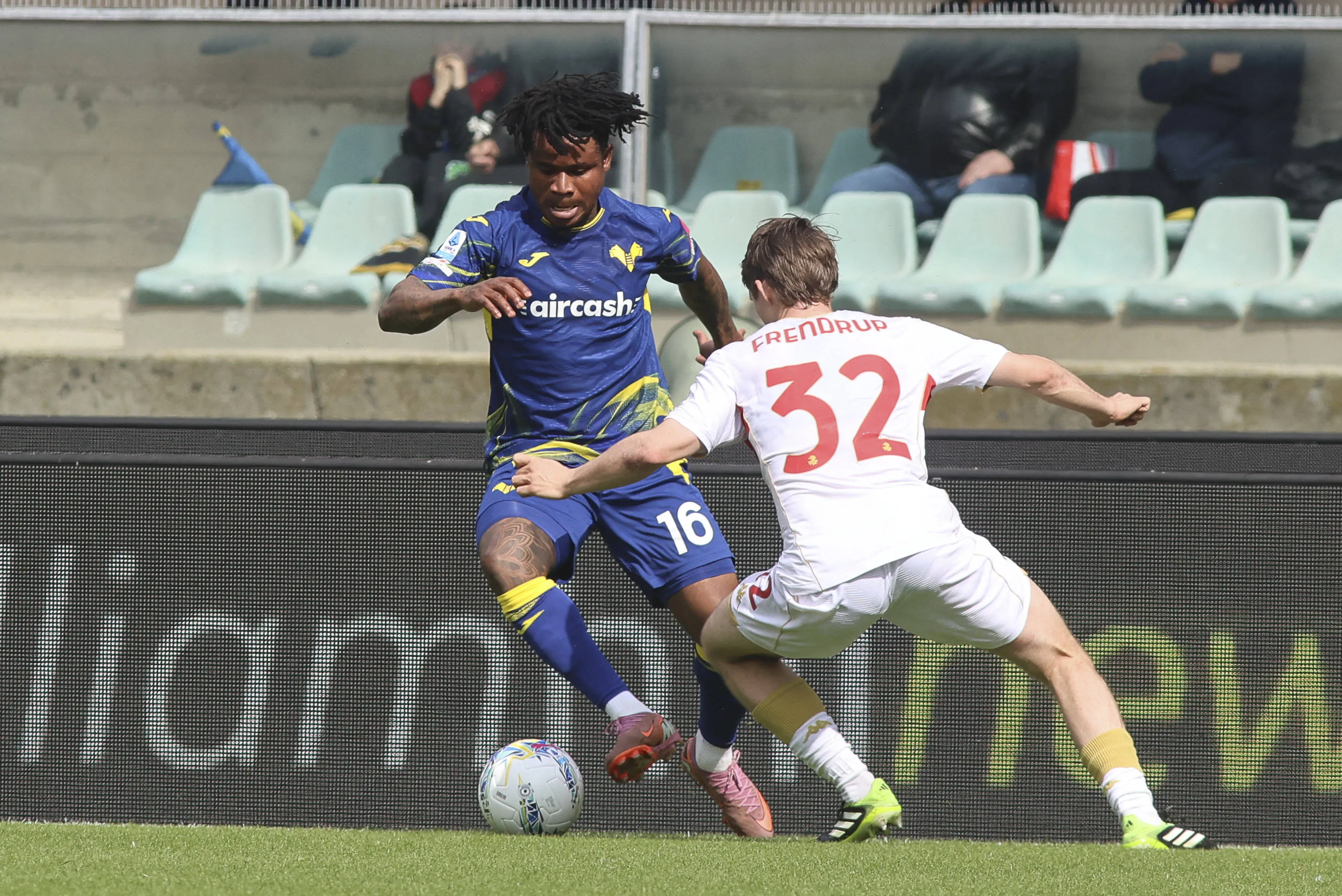 Gift Orban of Hellas Verona FC competes for the ball with Morten Frendrup of Genoa CFC during Hellas Verona FC vs Genoa CFC, 29&Acirc; Serie A Enilive 2025-26 game at Marcantonio Bentegodi stadium in Verona VR, Italy, on March 15, 2026.