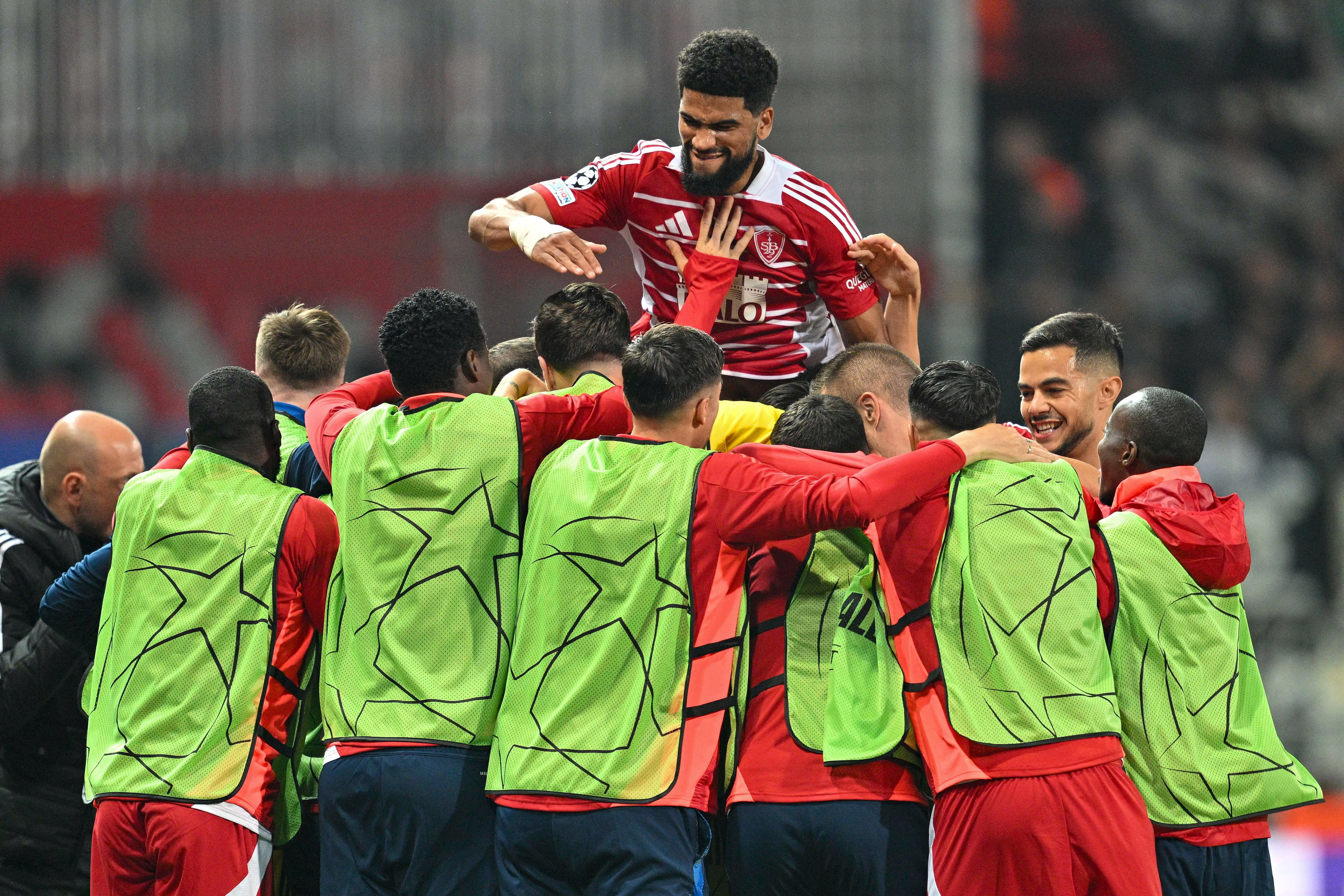 Brest players celebrate in the UEFA Champions League
