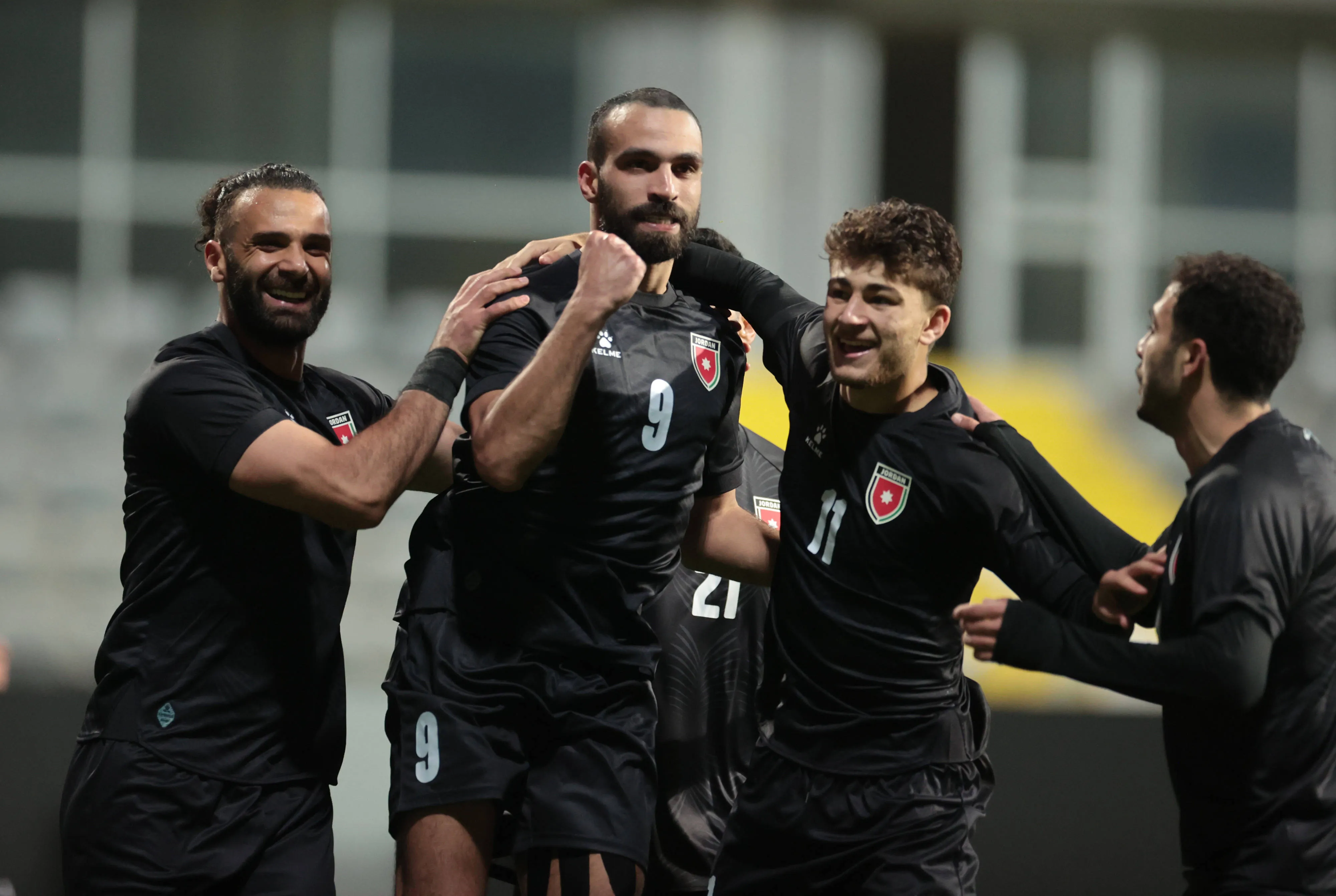 Baha Faisal and Odeh Fakhoury of Jordan celebrate scoring their team s goal against Costa Rica