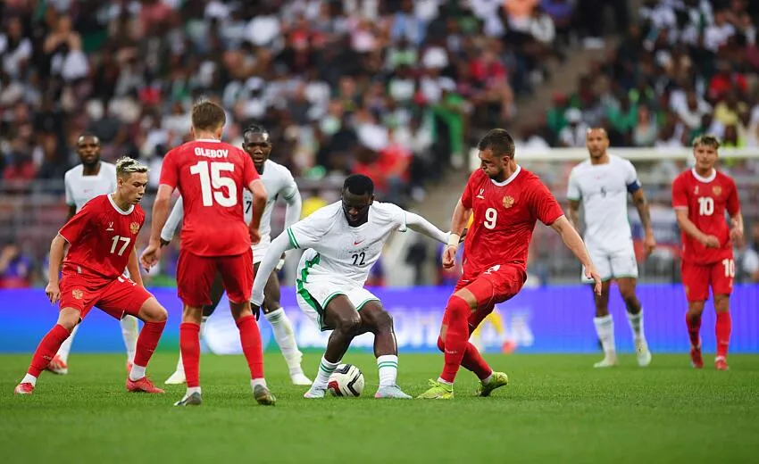 super eagles striker victor boniface between multiple russian players