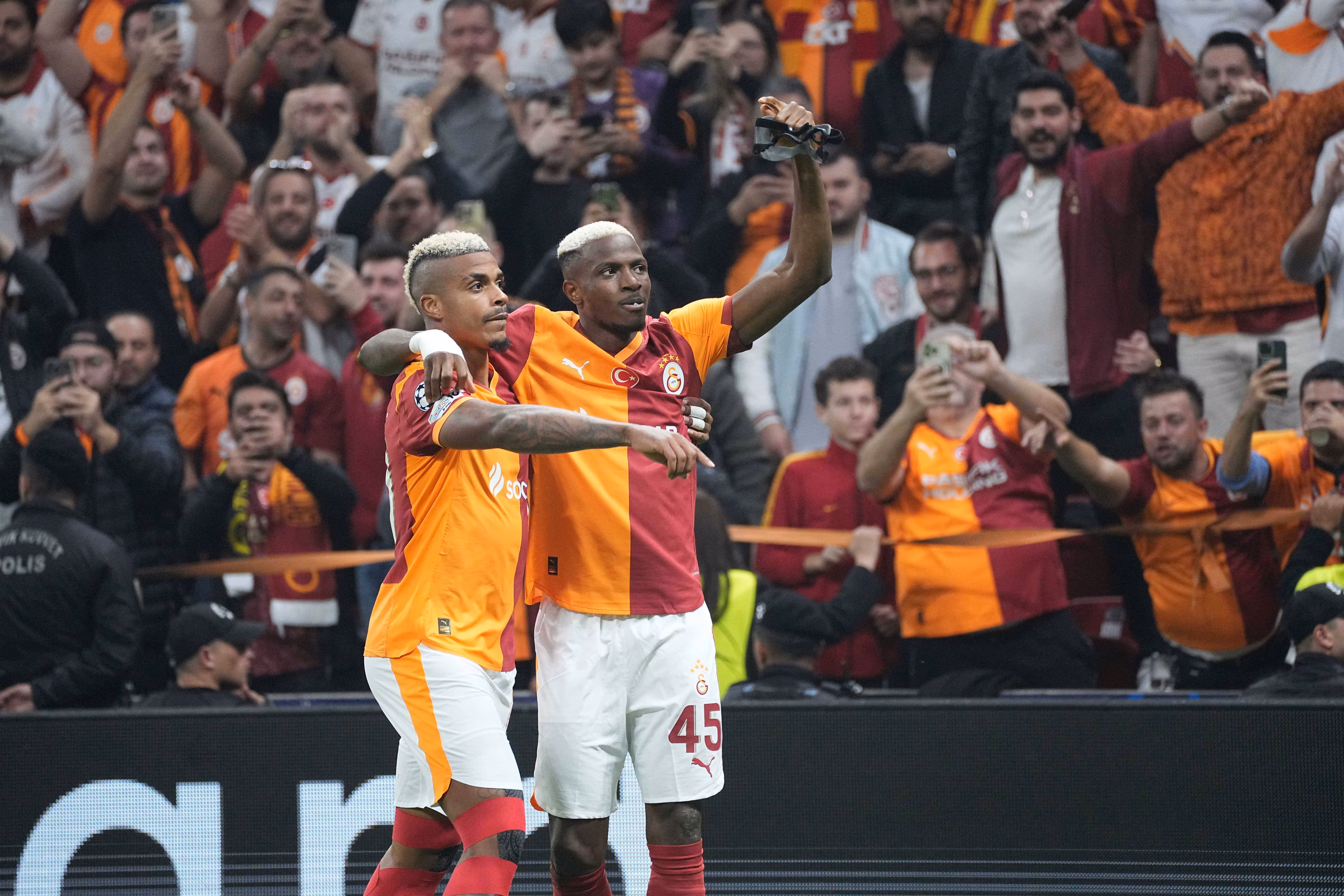 Victor Osimhen celebrates his goal with teammate Mario Lemina