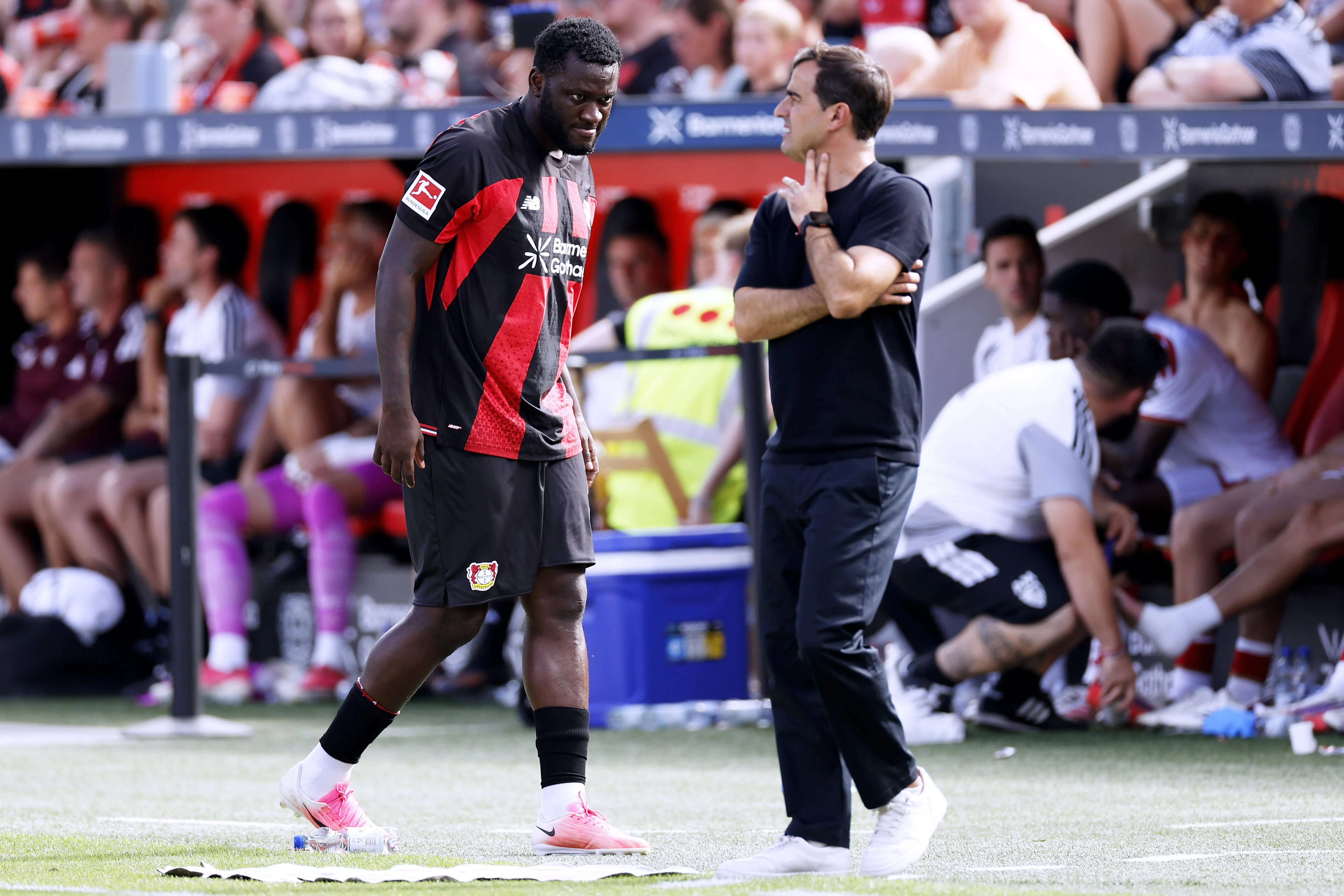 Carles Martinez and Victor Boniface of Bayer Leverkusen. 