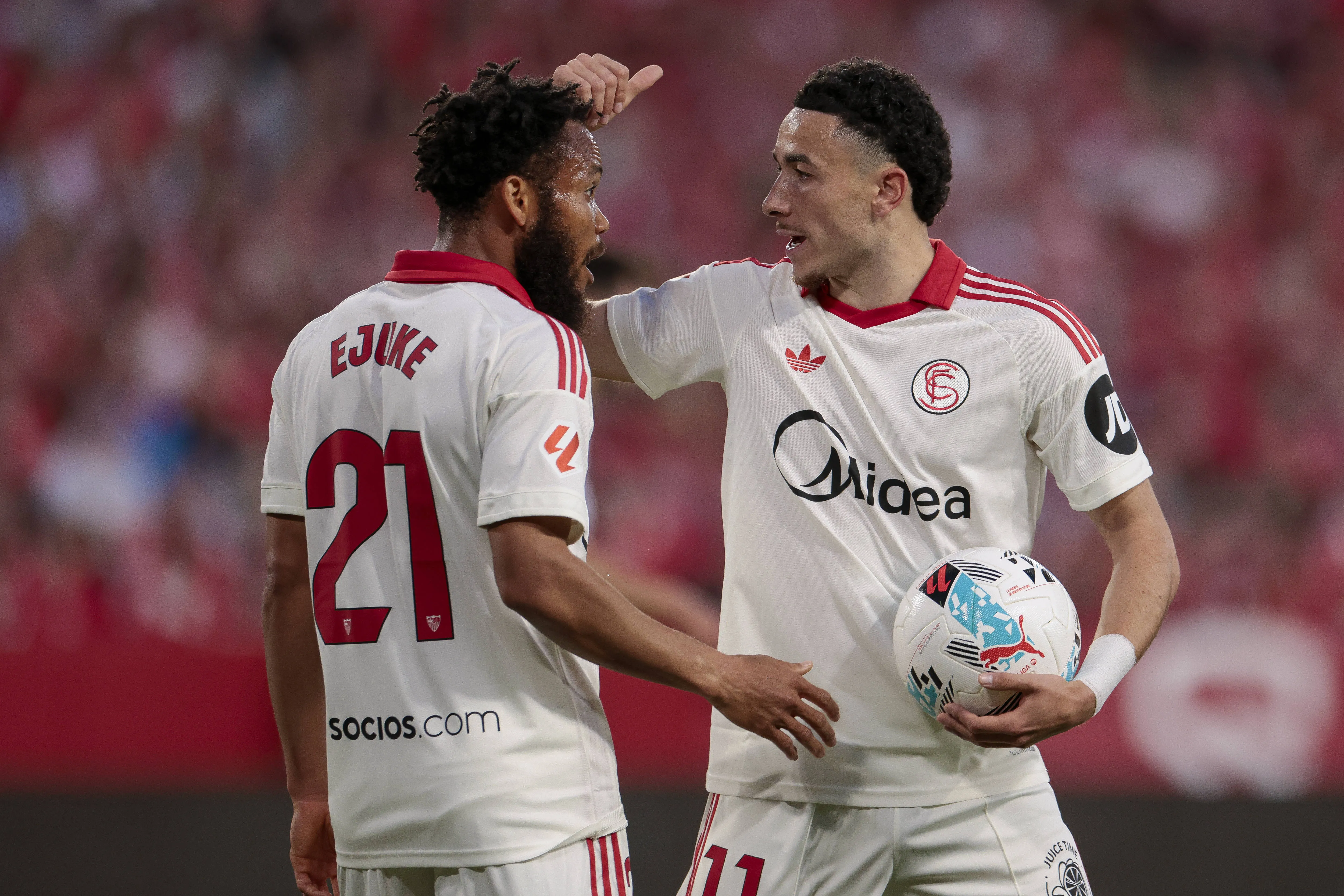Ruben Vargas talks to Chidera Ejuke of Sevilla FC.