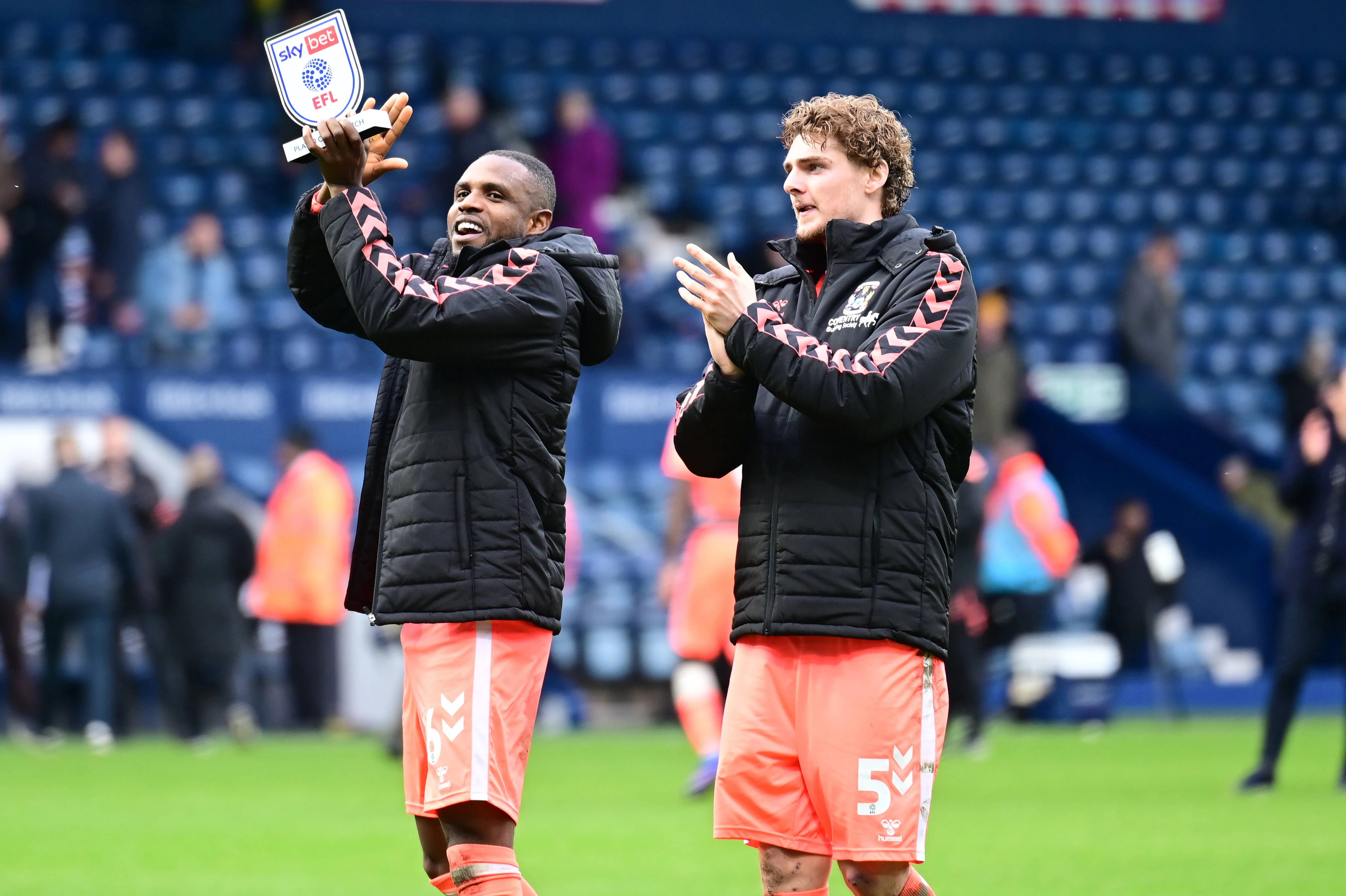 Frank Onyeka with his trophy is applauded by Jack Rudoni during the EFL Sky Bet Championship match between West Bromwich Albion and Coventry City