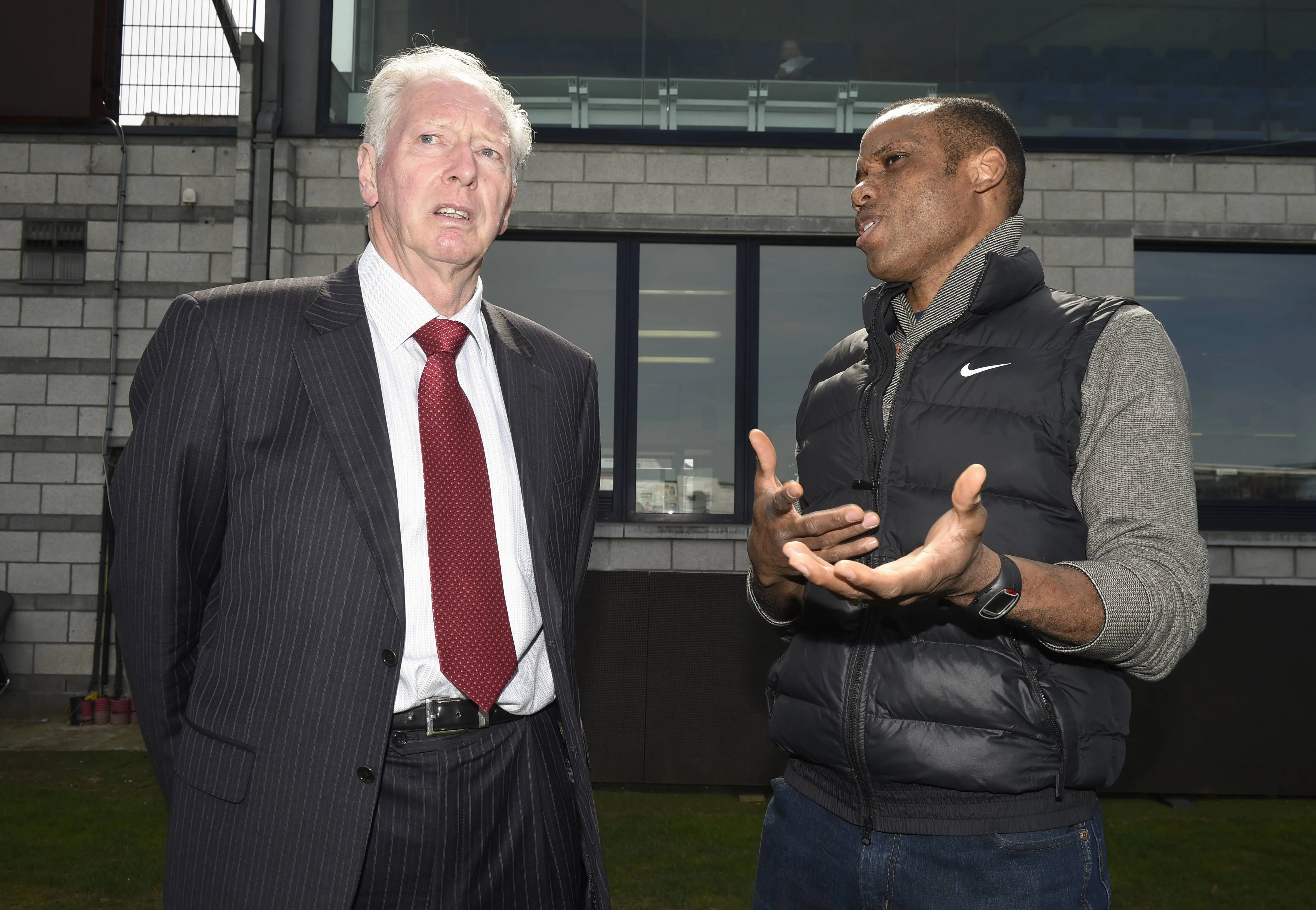 Former Nigerian national head coach Jo Bonfrere talks with Sunday Oliseh